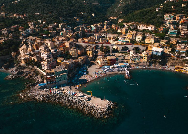 Aerial view of Bogliasco beach and colorful houses by the sea in Liguria, Italy