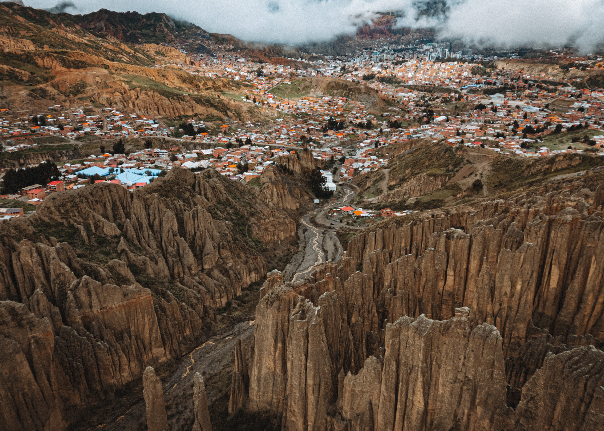 Aerial view of Valle de las Ánimas near La Paz, Bolivia, with dramatic rock spires and colorful houses
