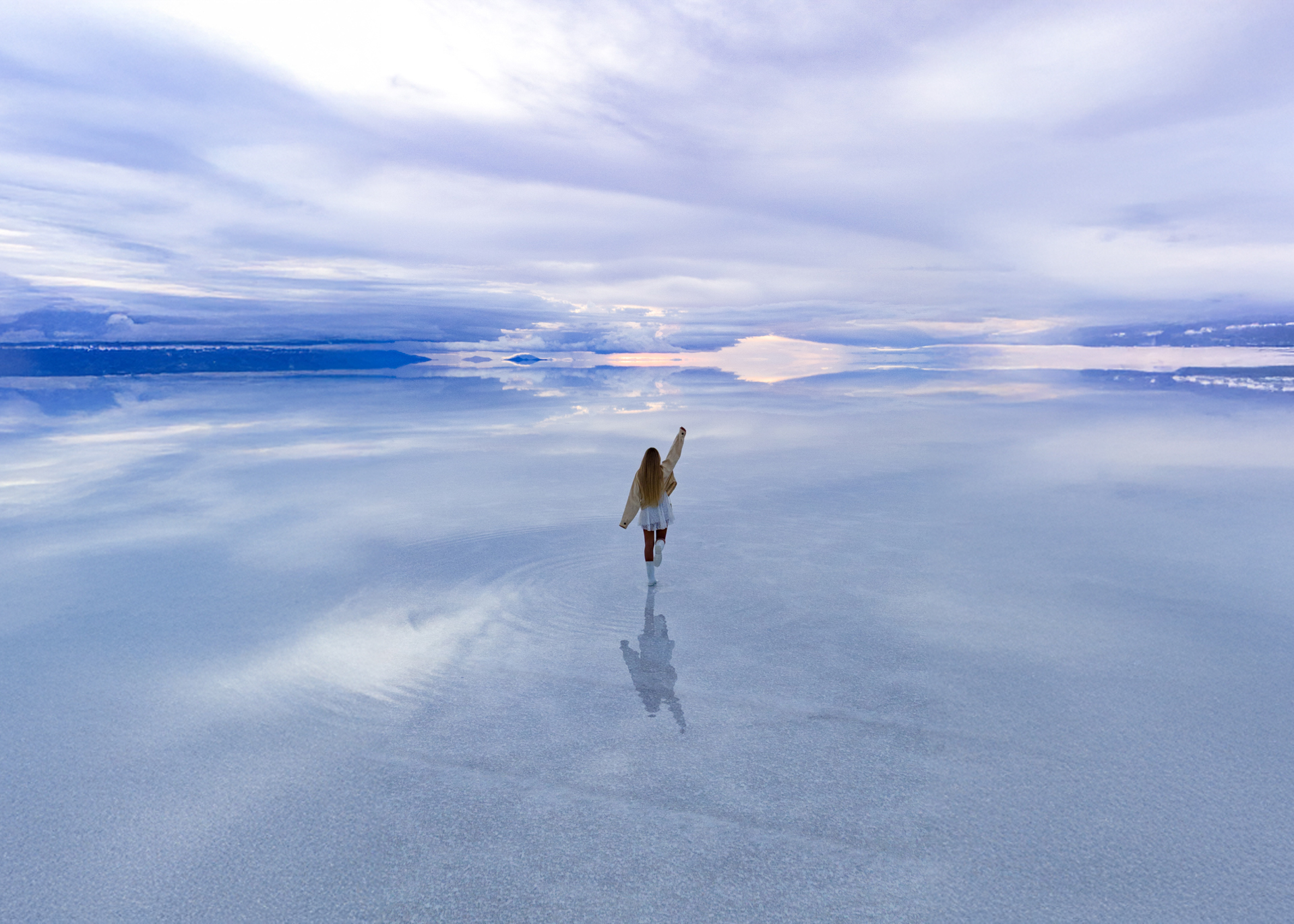 The Uyuni Salt Flats during sunset.