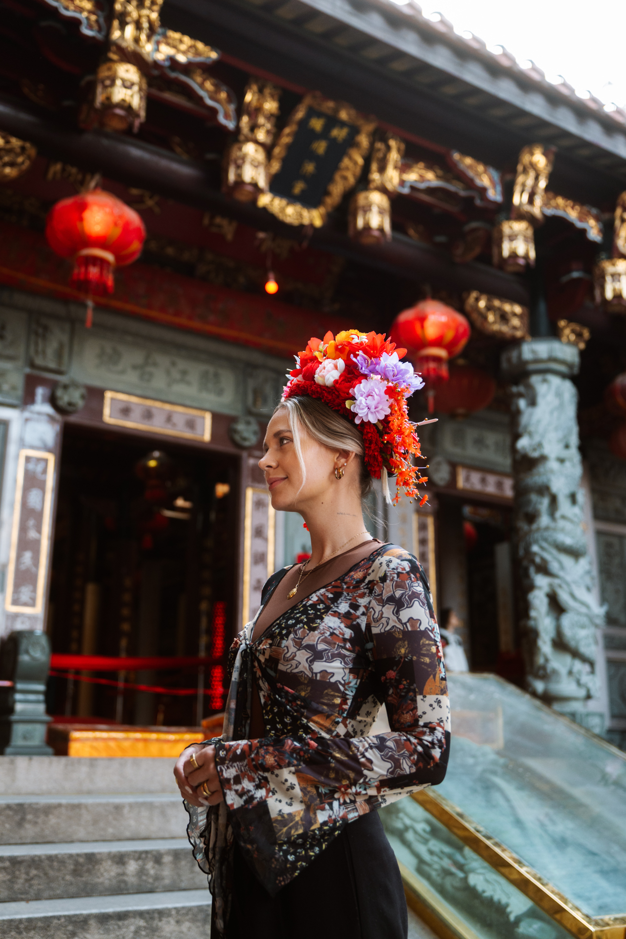 Fujian Woman wearing traditional flowers on her head in Xunpu, Fujian in China