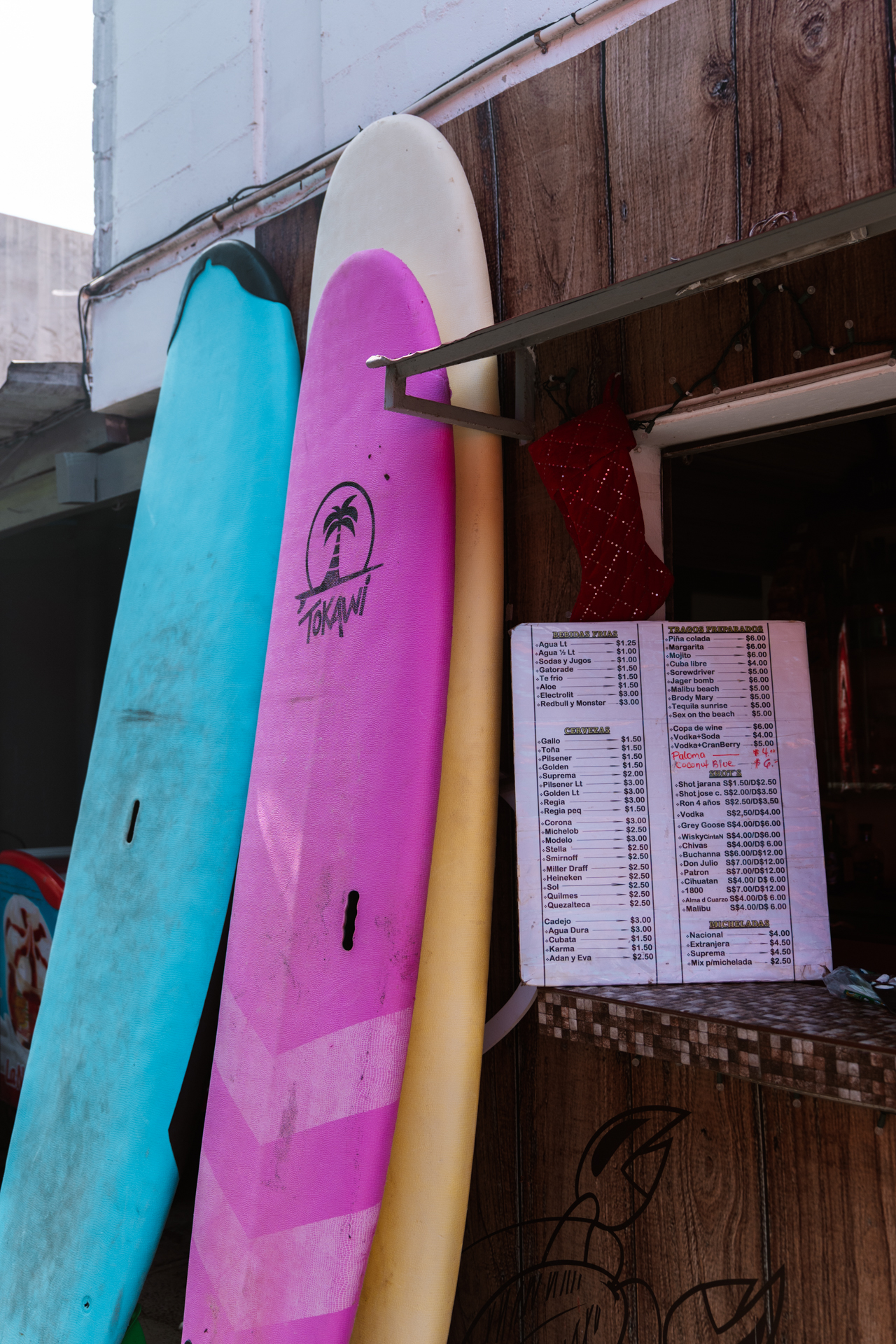 Colorful surfboards outside beach bar in El Tunco, El Salvador