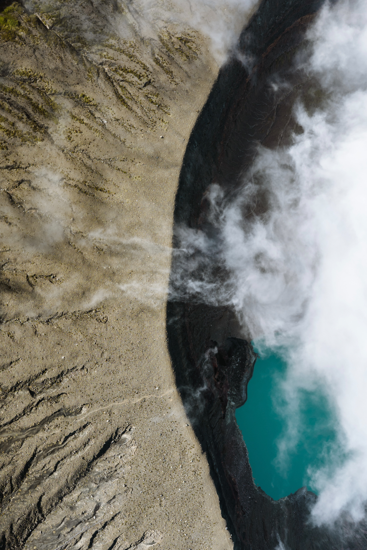 Aerial view of Santa Ana Volcano crater and turquoise lake, El Salvador