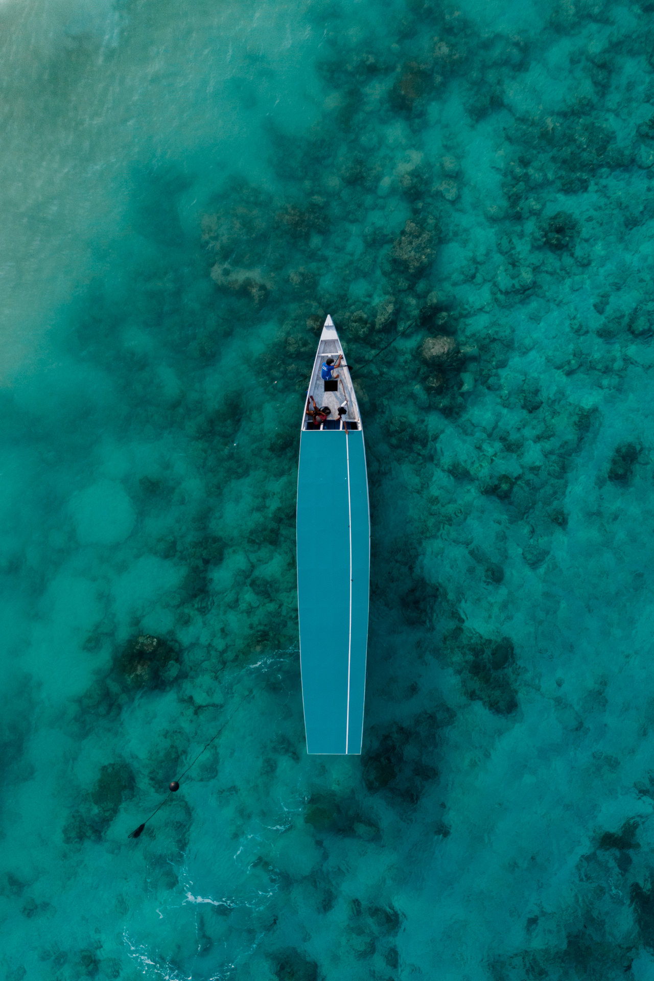 Aerial view of traditional boat over turquoise water in Gili Trawangan