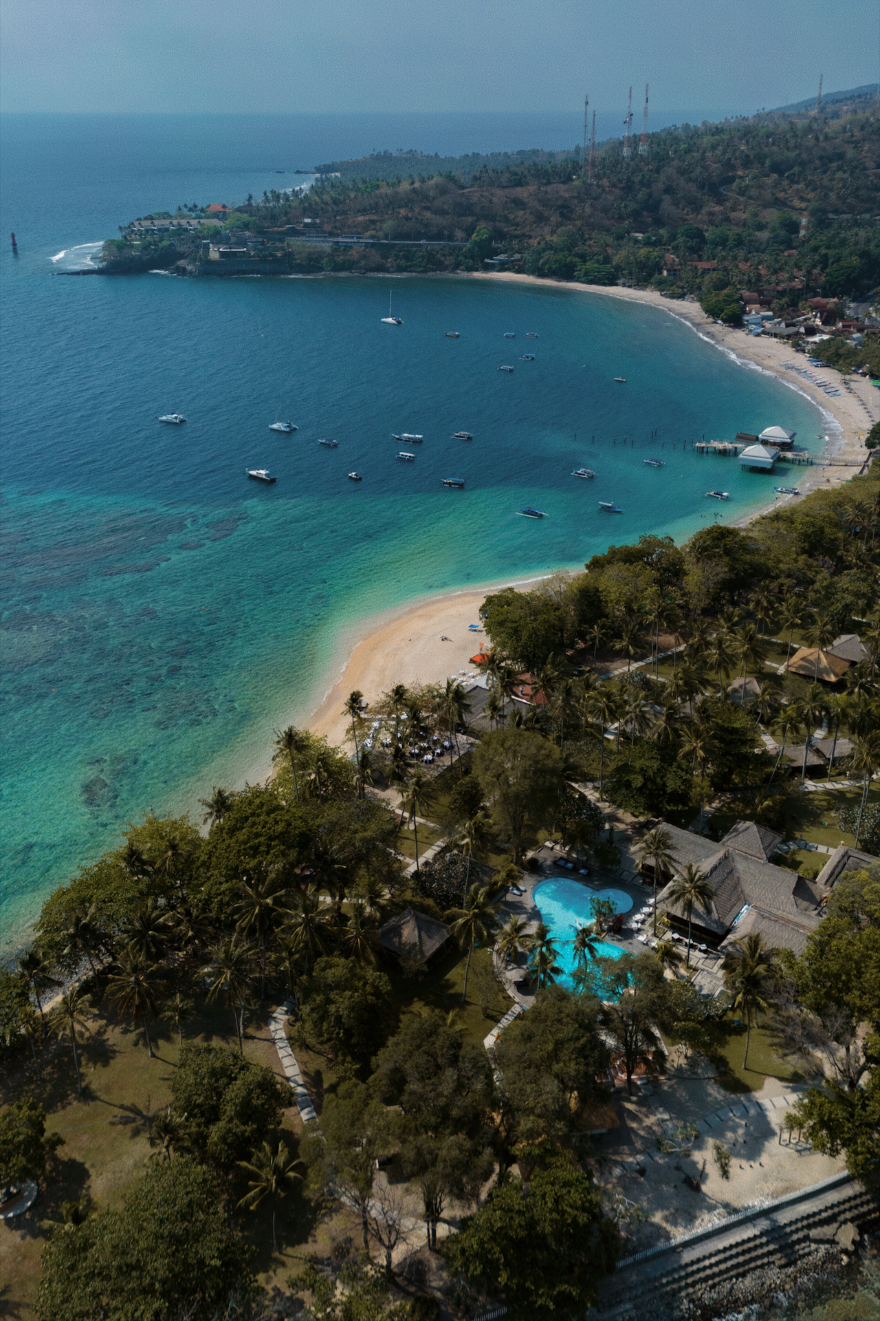 Aerial view of Senggigi Beach Lombok with turquoise bay, boats, and coastal resort
