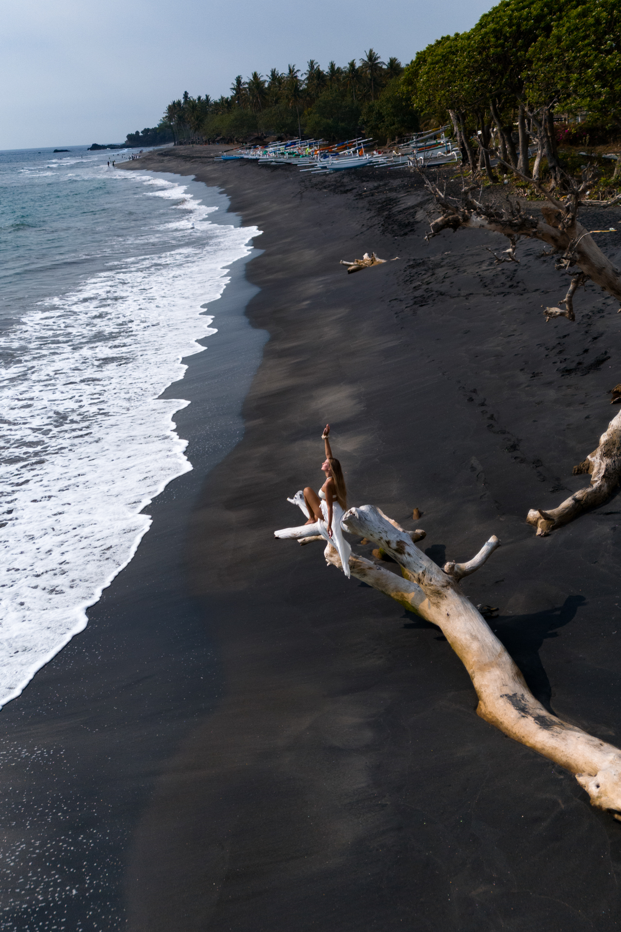 Pantai Kita black sand beach Lombok with dramatic coastline views