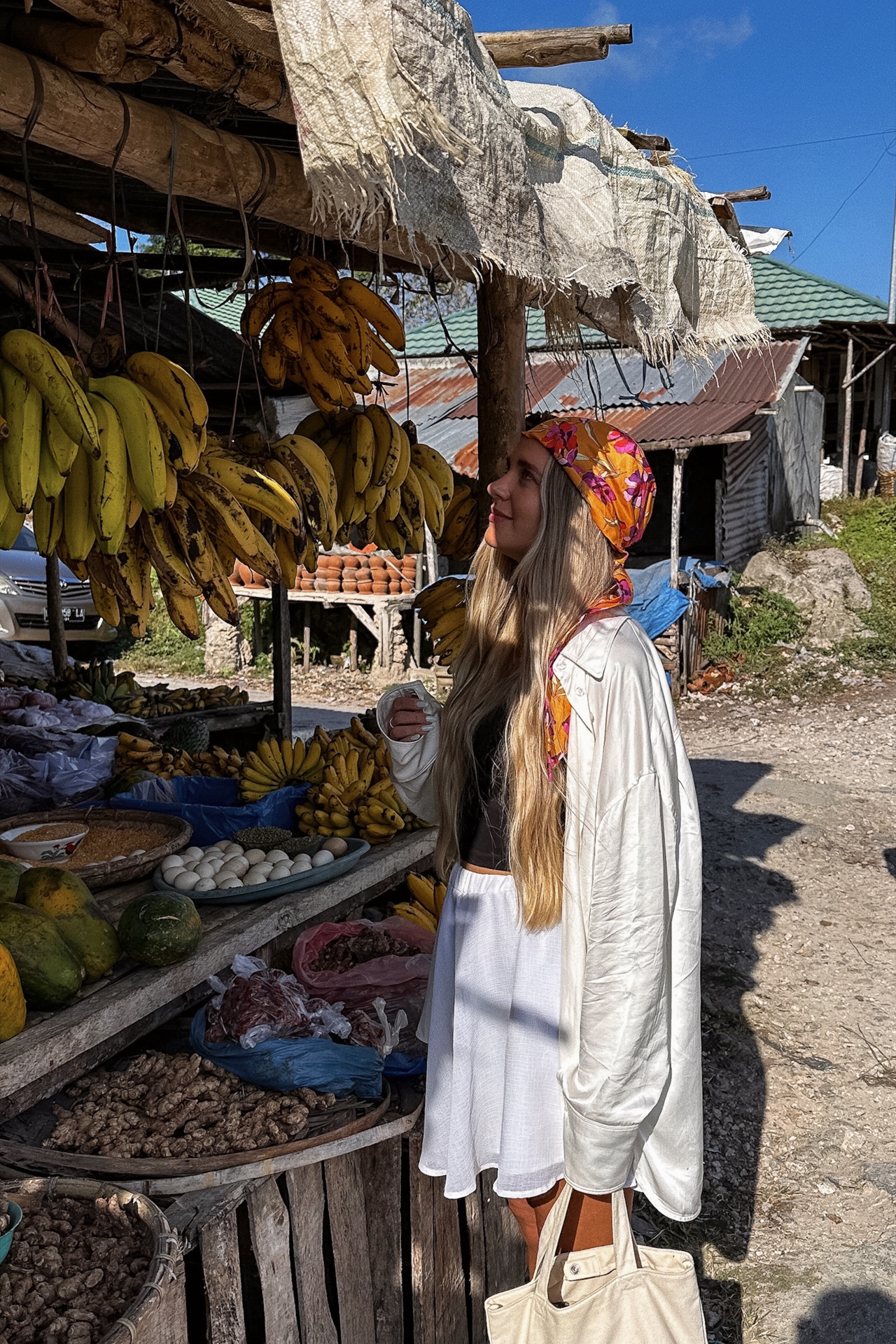 Woman shopping at a local market in Sumba