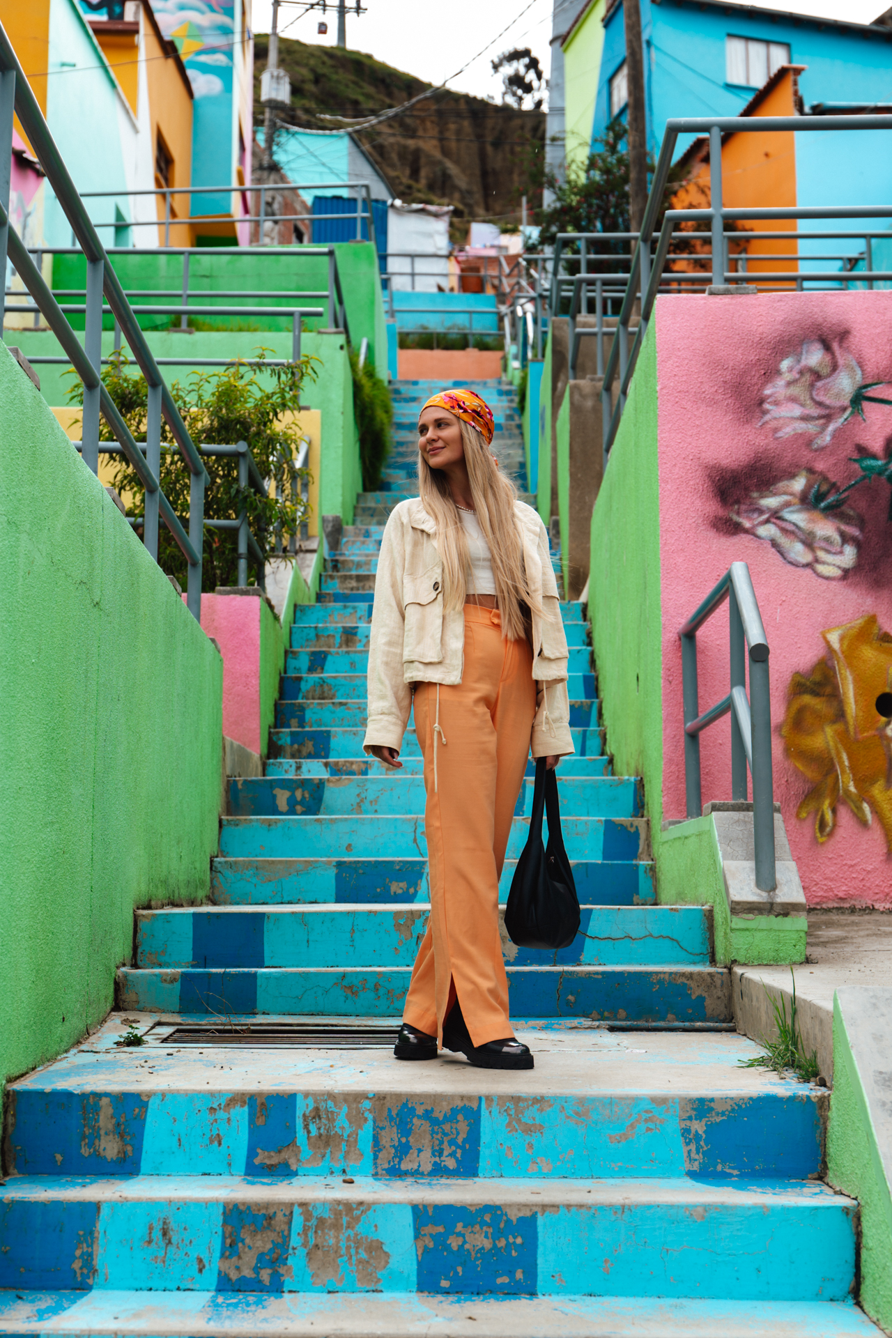 Exploring the colorful Chualluma neighborhood, where every staircase and wall bursts with art.