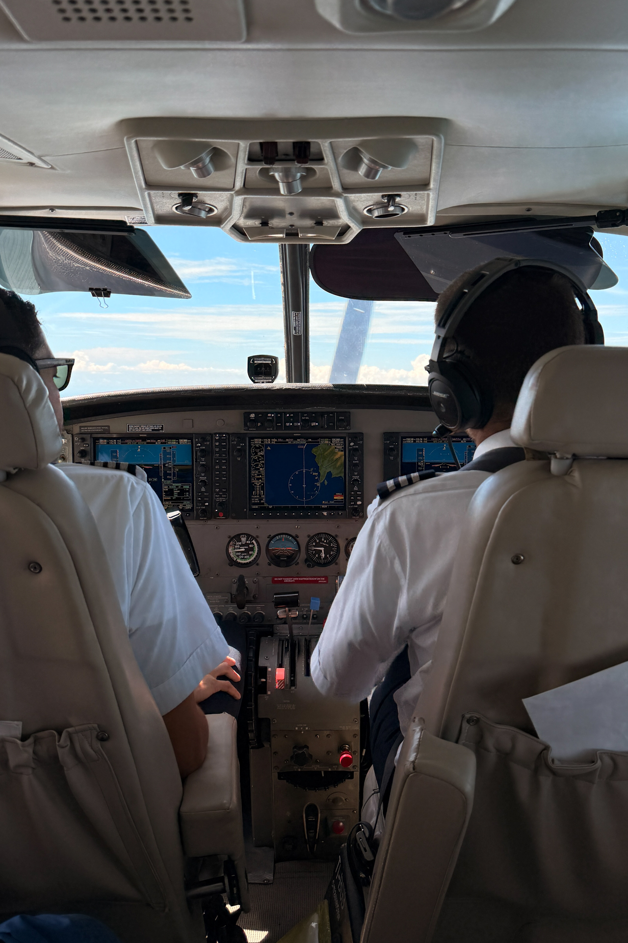 View from inside a small plane cockpit during a domestic flight in Costa Rica