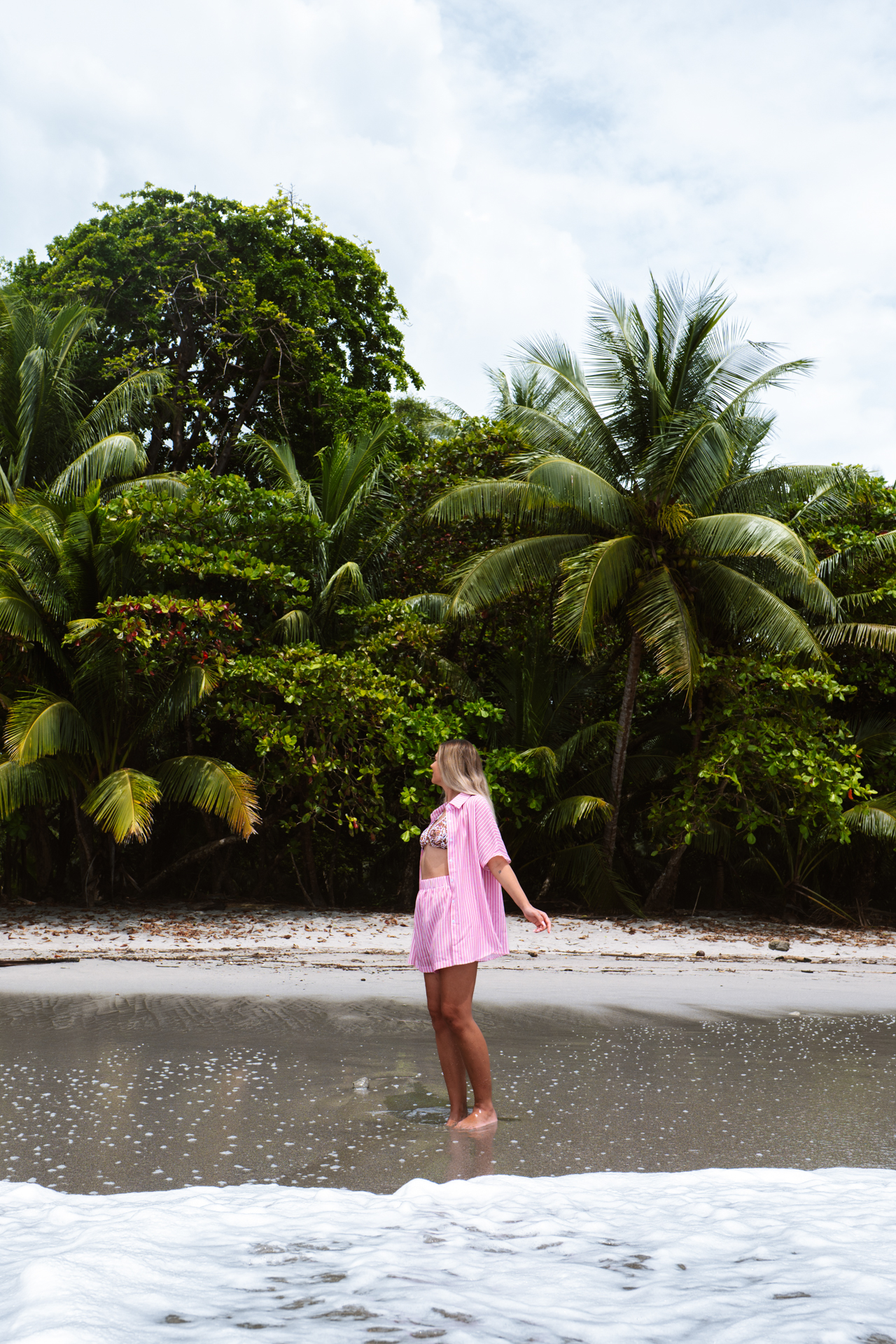 Manuel Antonio woman standing at the beach
