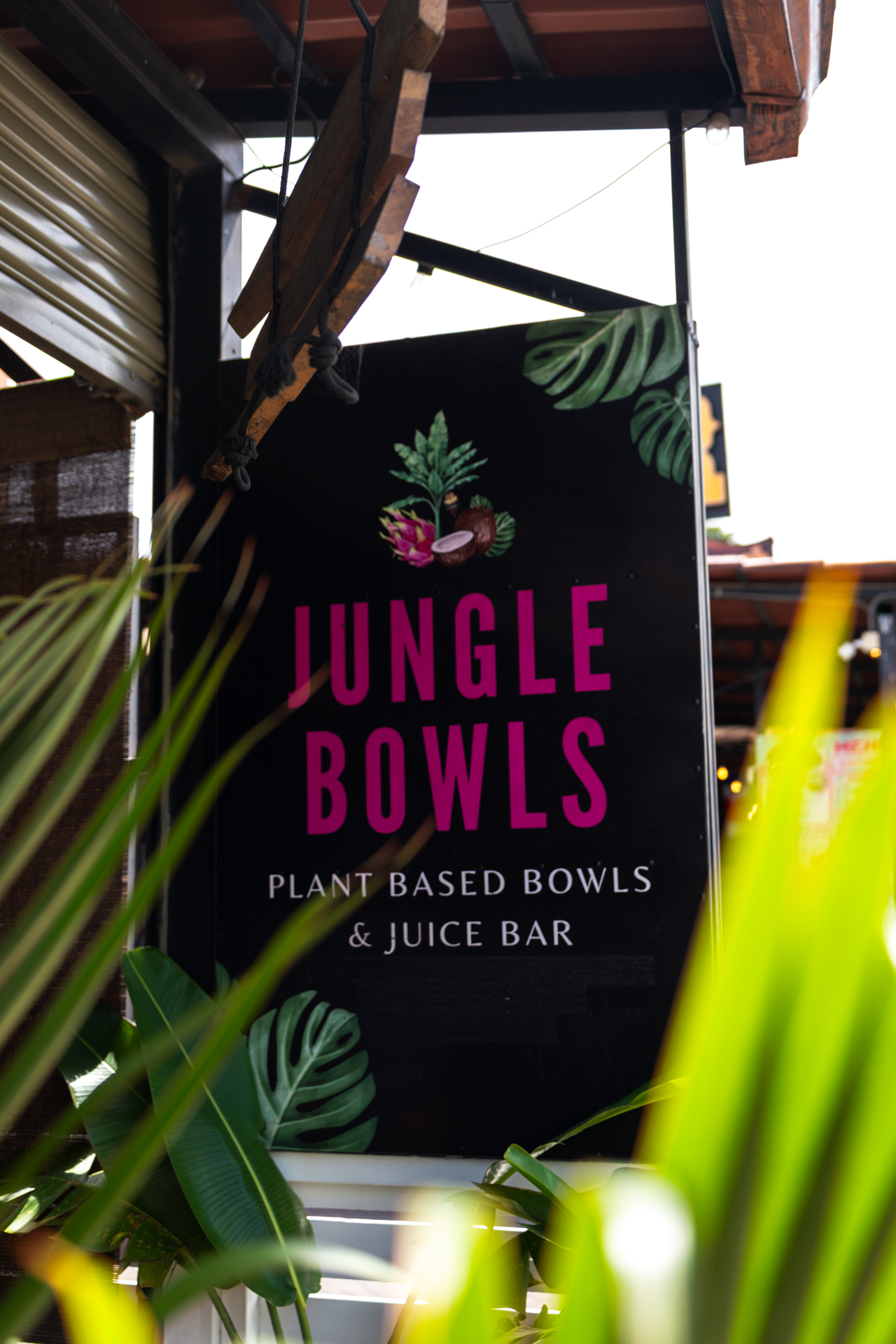 Jungle Bowls plant-based café sign in La Fortuna, Costa Rica