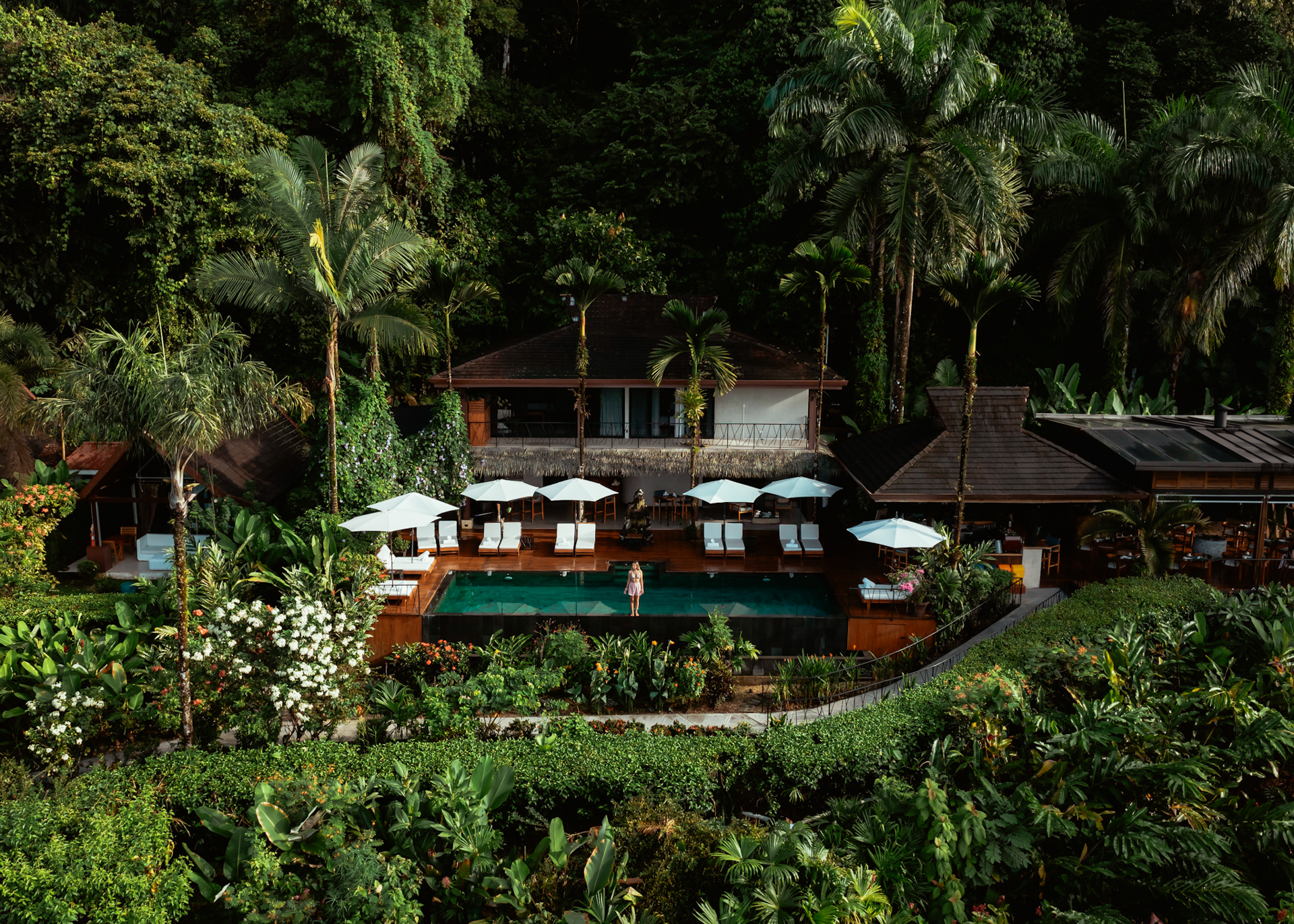 Oxygen jungle villa with infinity pool surrounded by lush tropical rainforest in Costa Rica