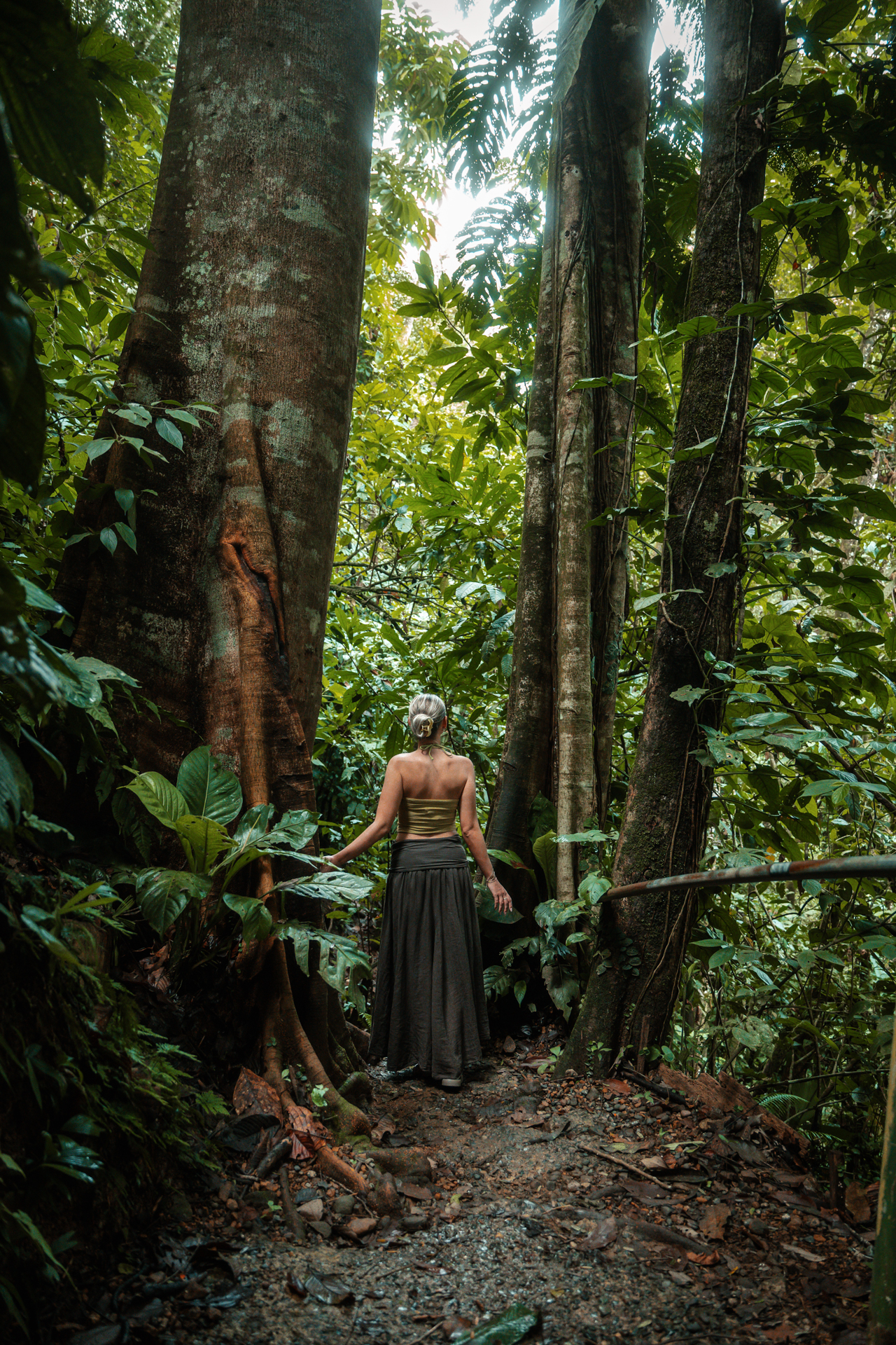 Woman walking through the jungle in Uvita, Costa Rica