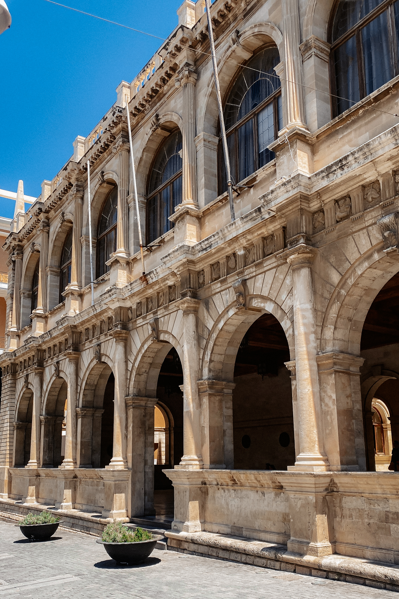 Venetian Loggia building in Heraklion Crete with historic stone arches