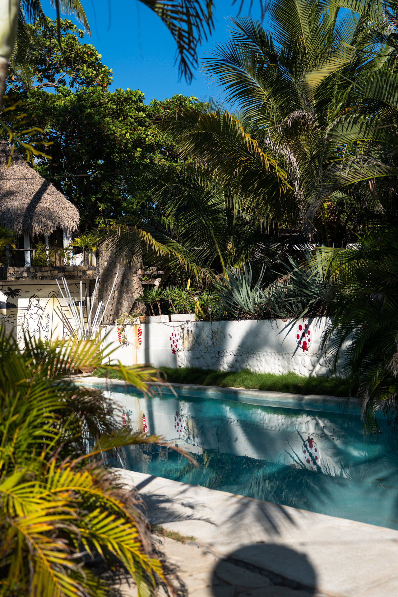 El Tunco El Salvador tropical hotel pool with palm trees