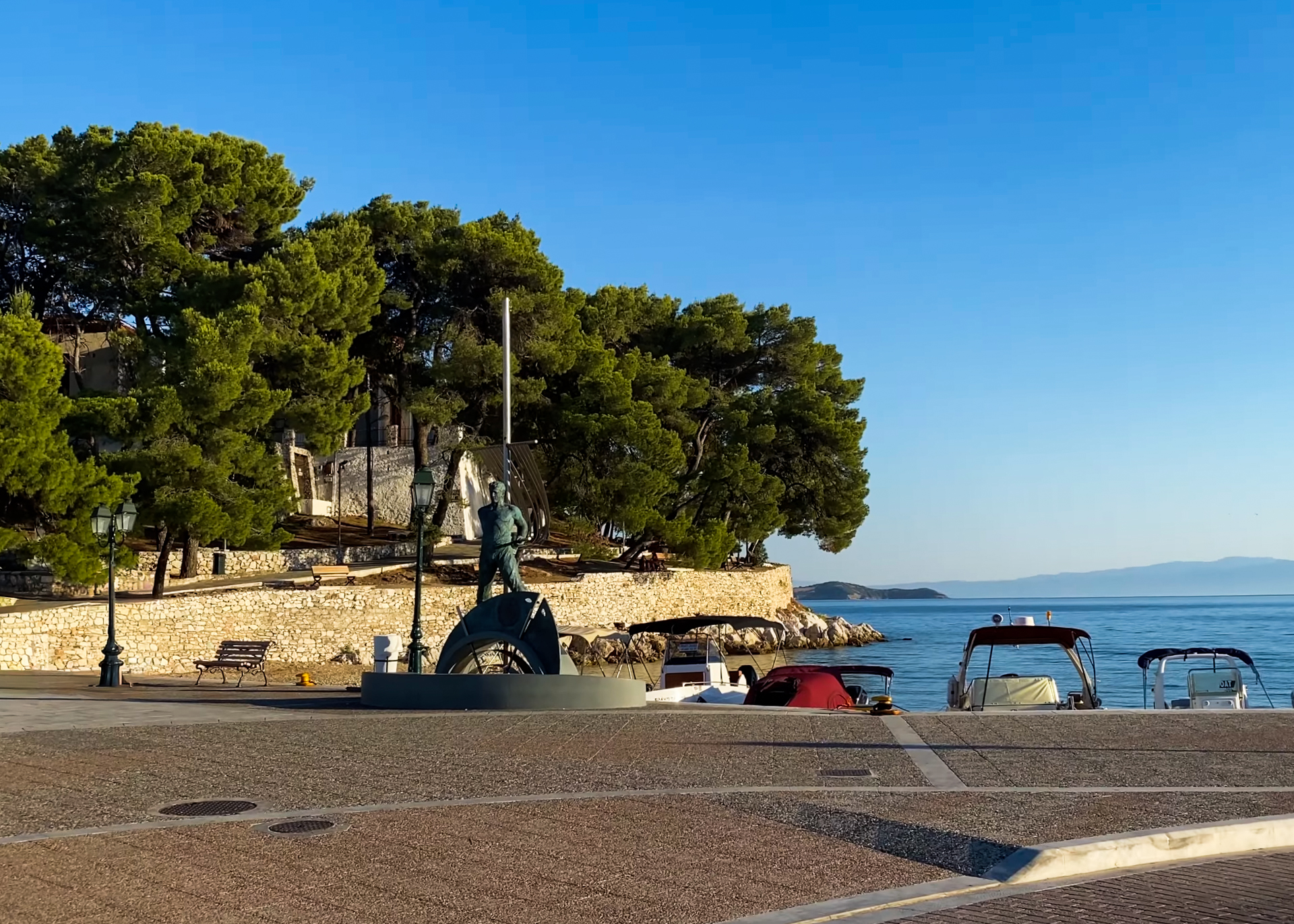 Skiathos harbor with boats and seaside promenade