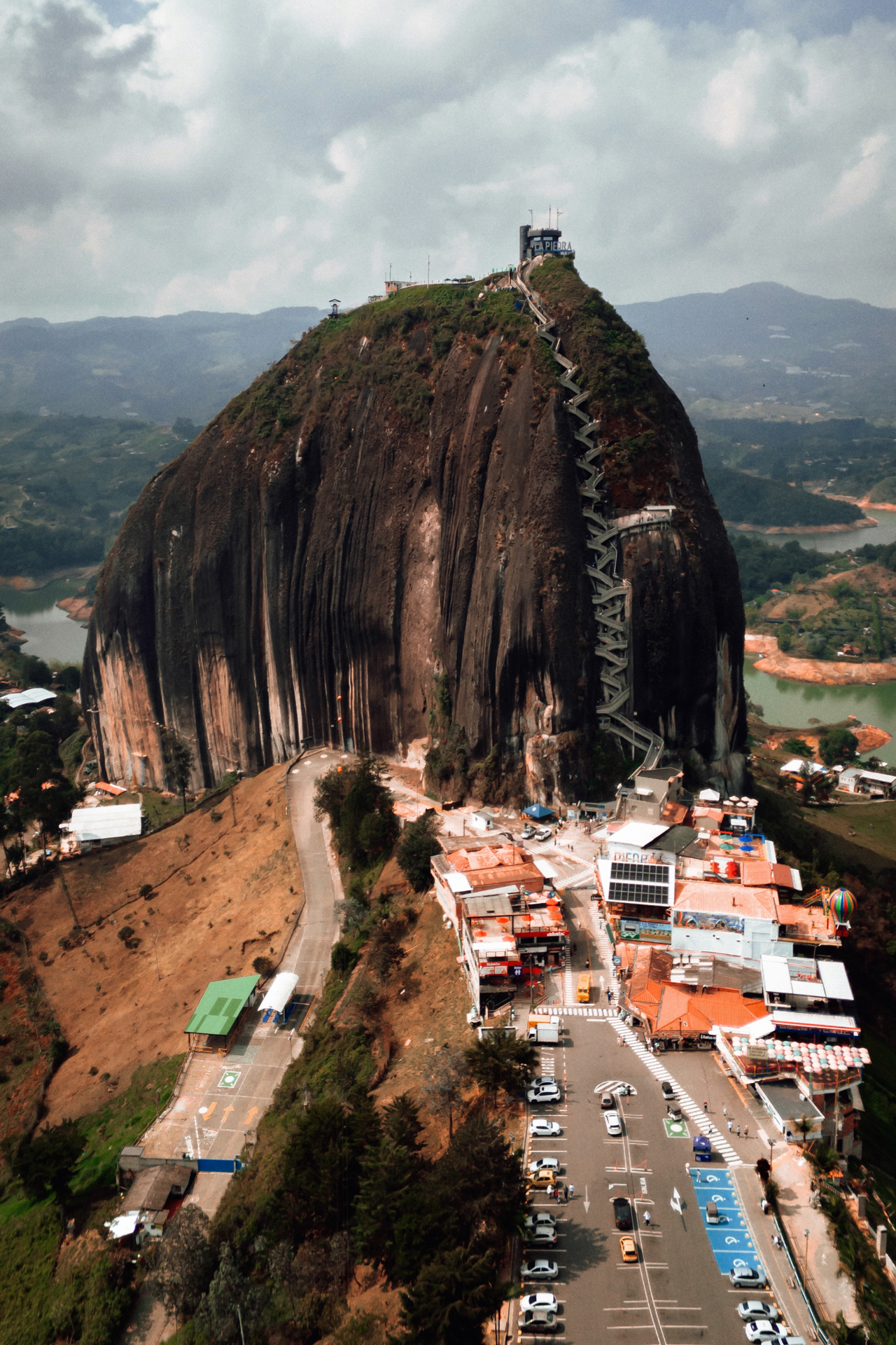 El Penol rock Guatape aerial view with stairs and surrounding lake landscape