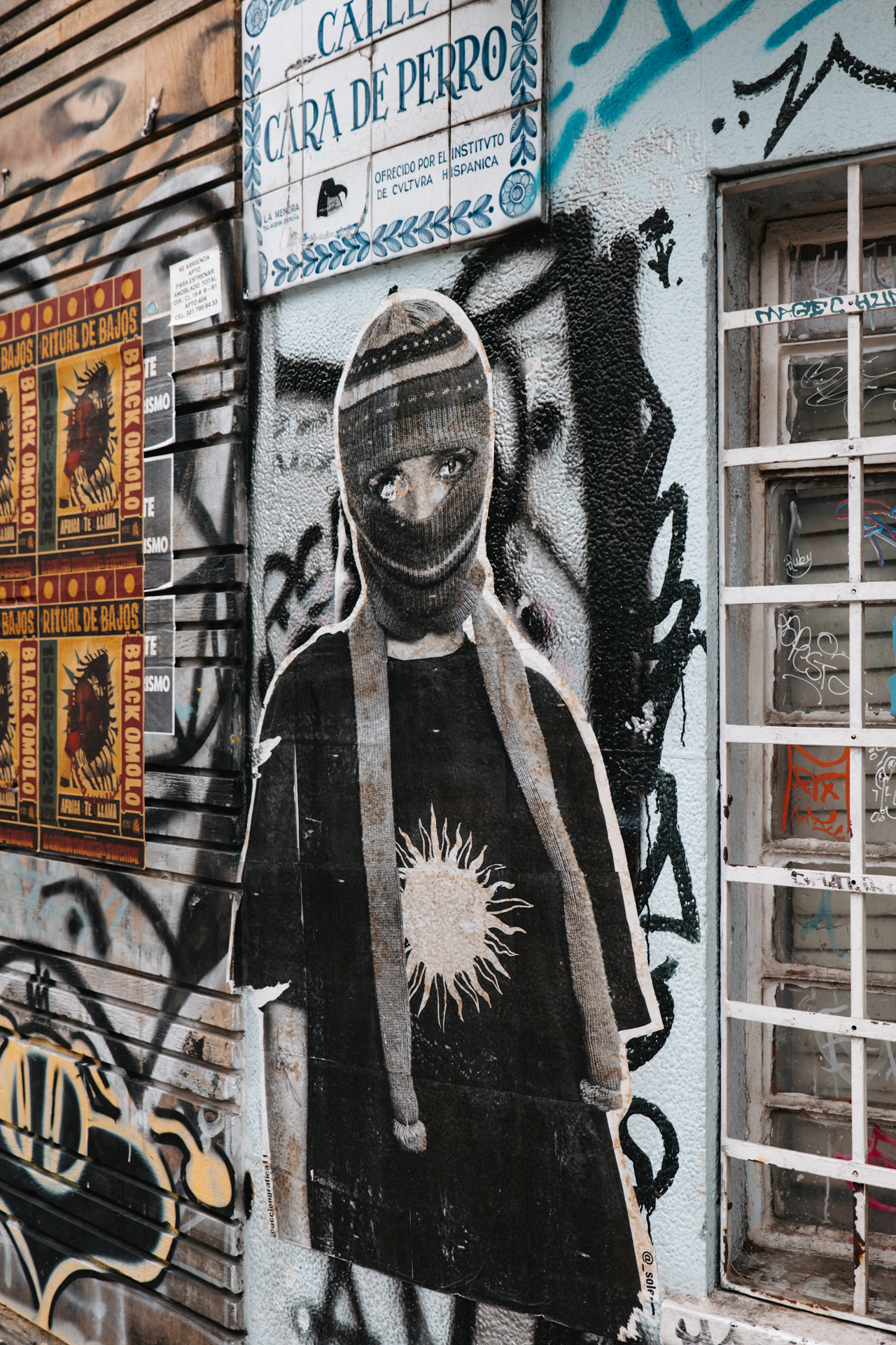 Street art and quiet plaza scenes in Bogotá, Colombia.