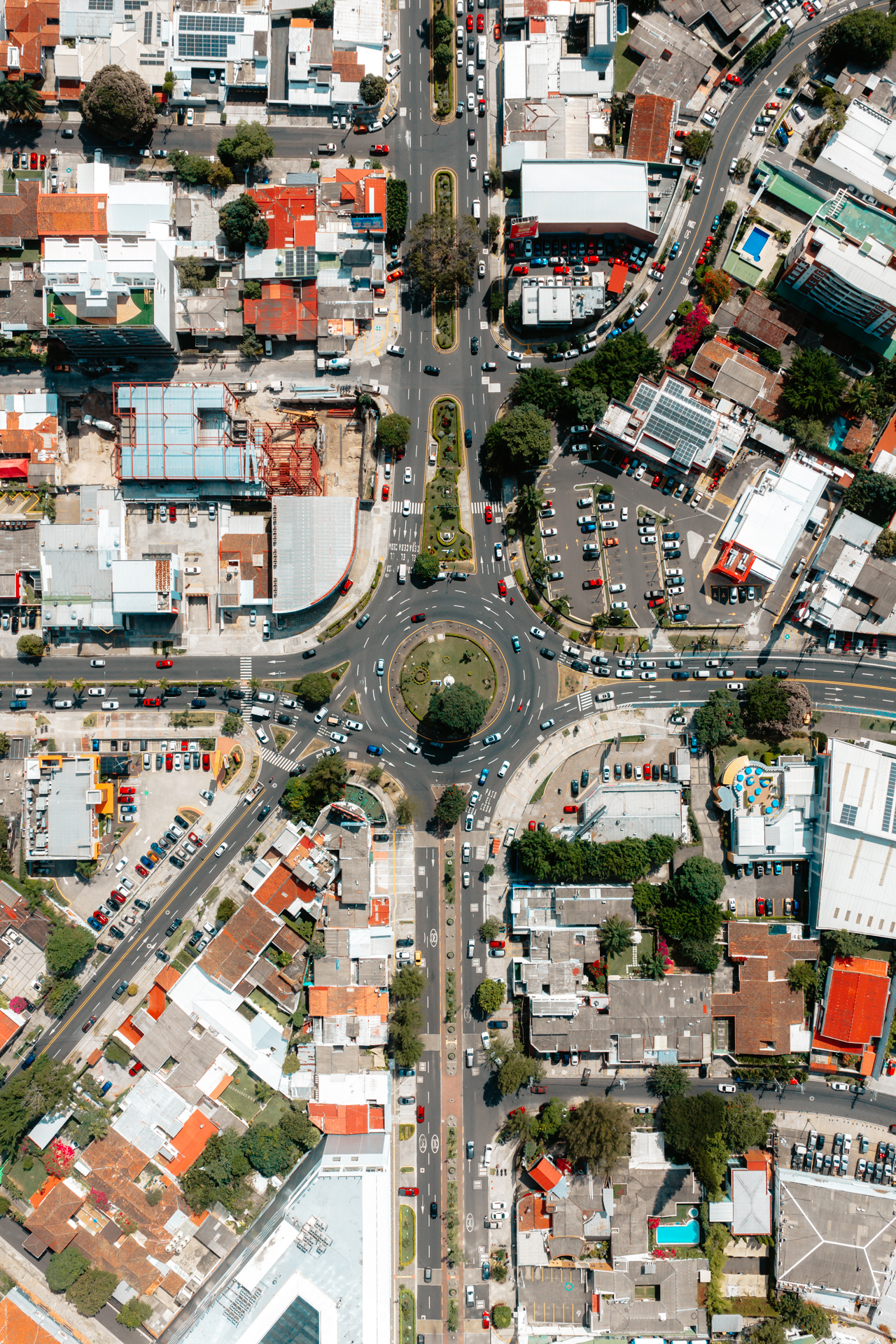 Aerial view of roundabout and city streets in San Salvador