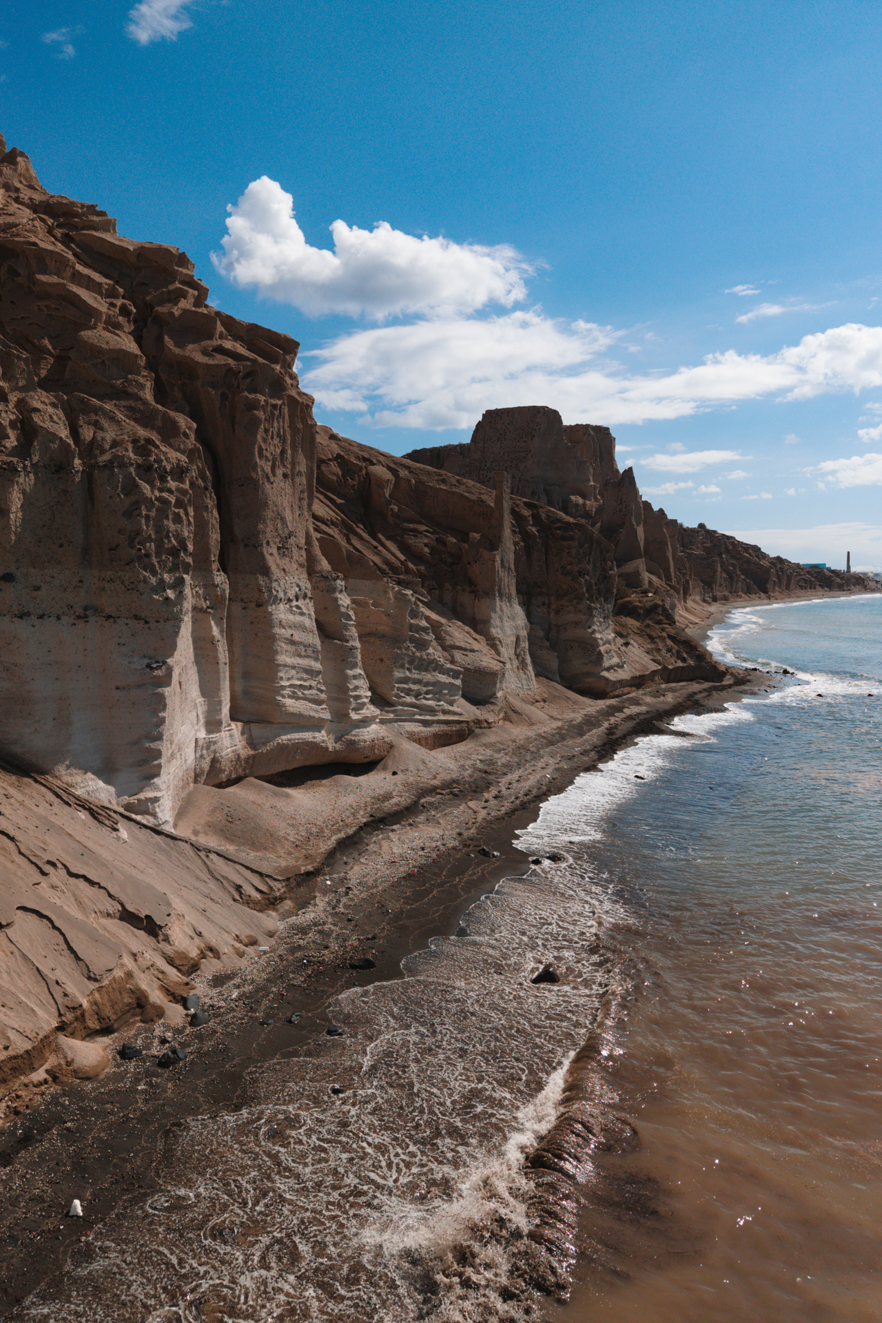 Eros Beach Santorini with unique white cliffs and volcanic coastline by the sea