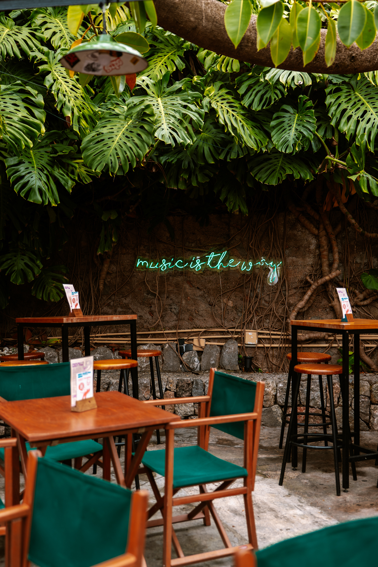 Tropical courtyard bar at Sa Fonda Deià in Mallorca, Spain