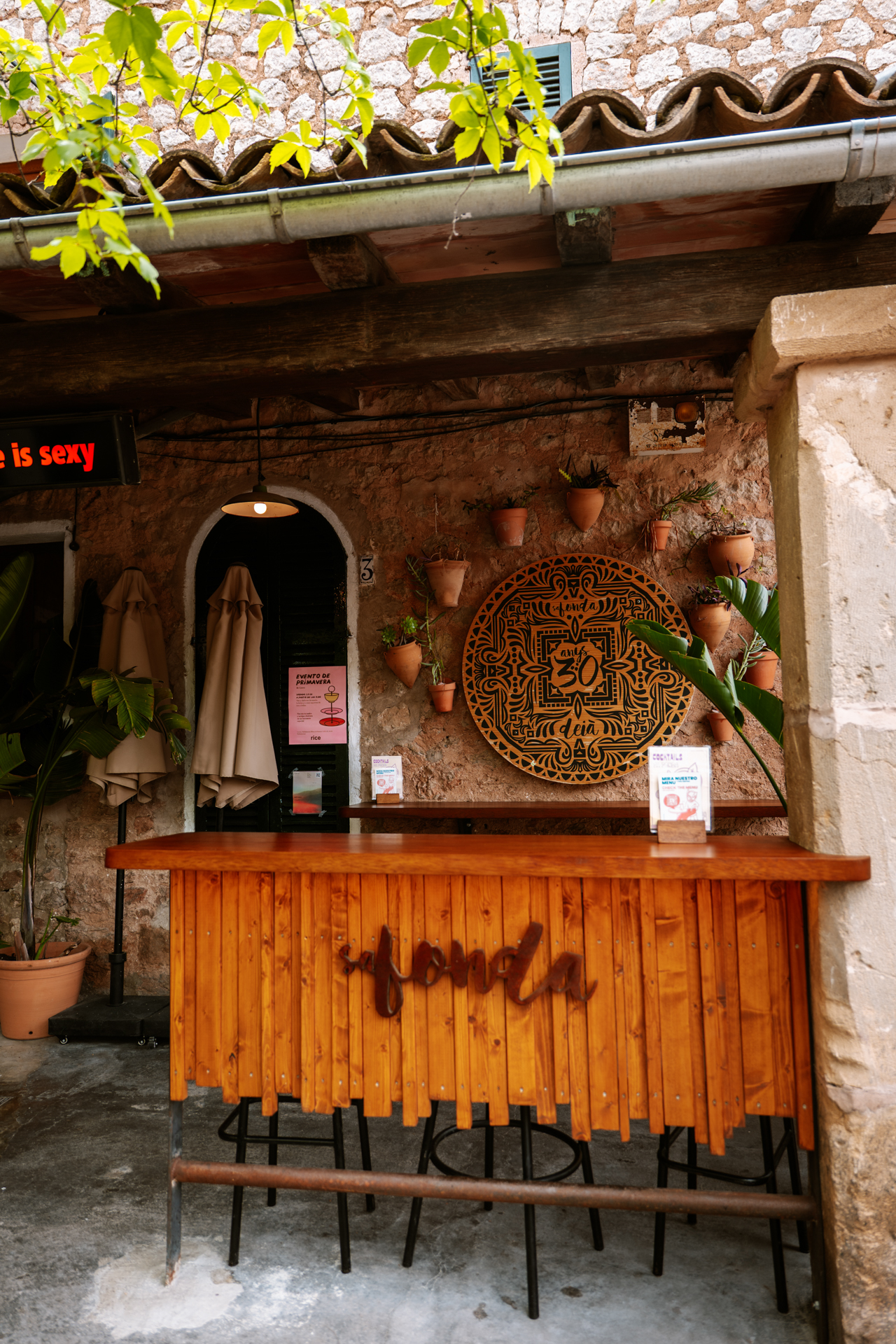 Rustic entrance to Sa Fonda Deià bar in Mallorca village