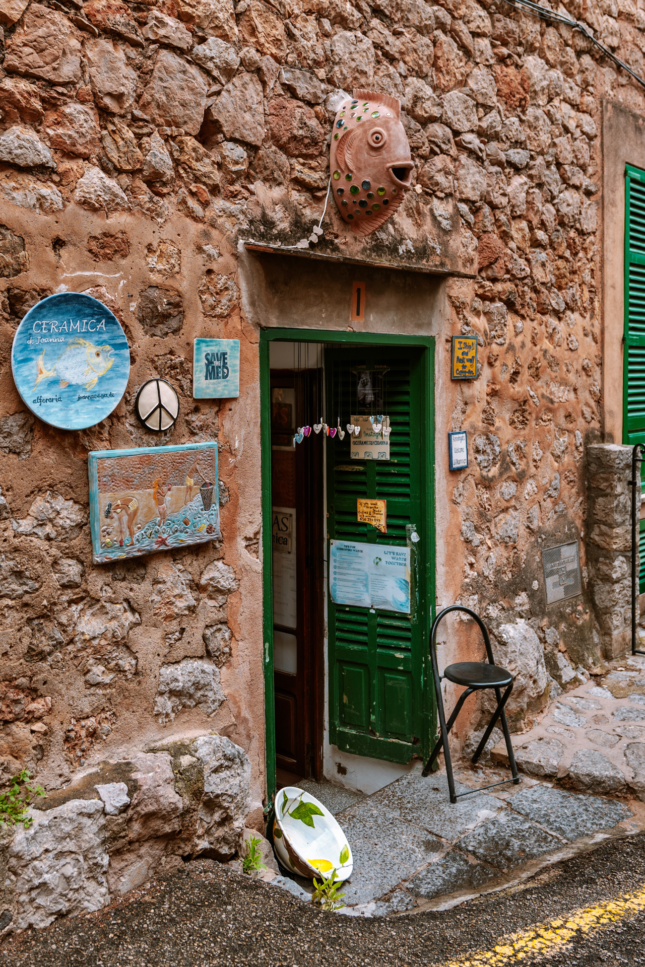 Rustic ceramic shop entrance in Deià village, Mallorca, Spain
