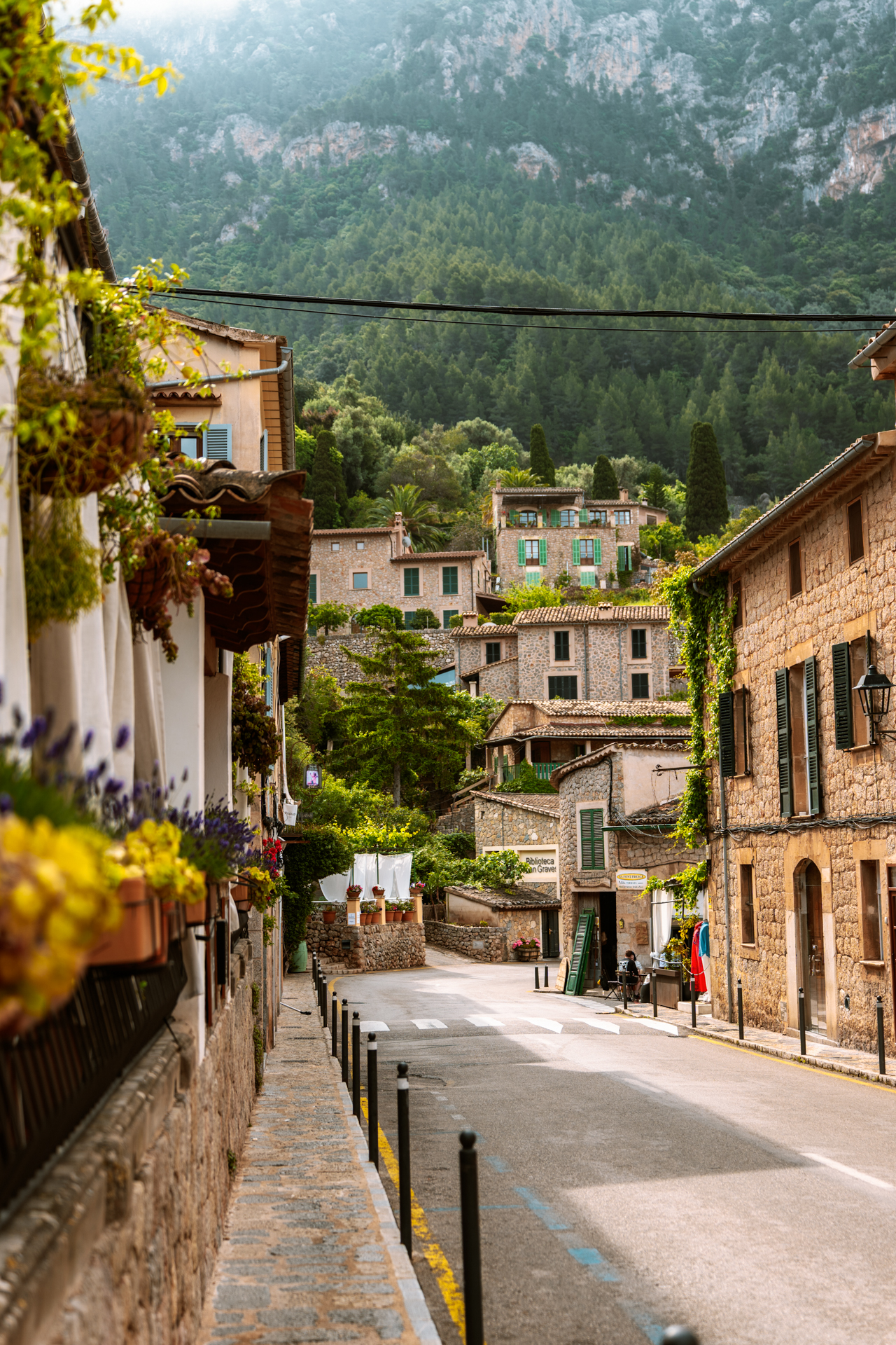 Scenic street view of Deià village in Mallorca mountains, Spain