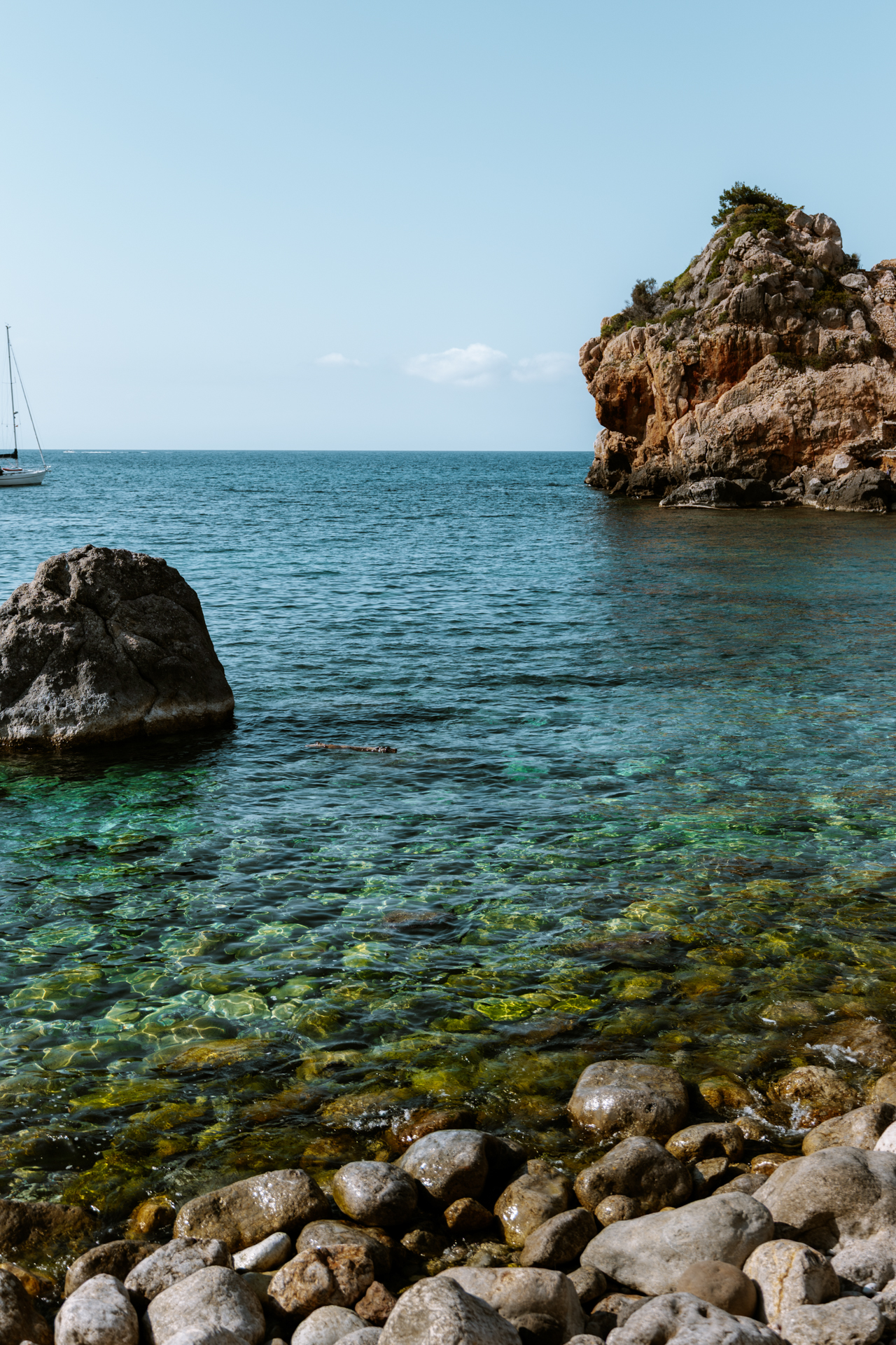 Crystal-clear water at Cala Deià, Mallorca