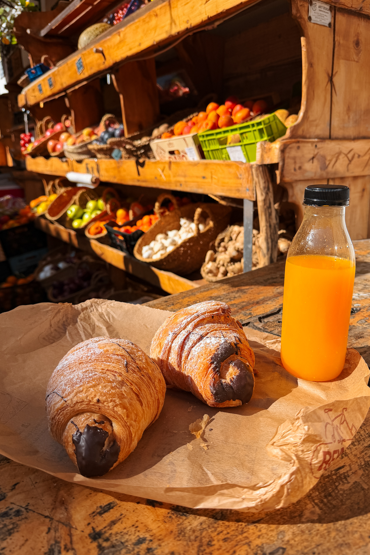 Fresh pastries and orange juice at local market in Deià, Mallorca