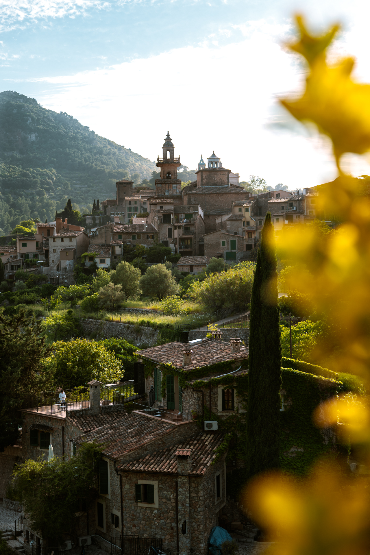 Panoramic view of Valldemossa village surrounded by the Tramuntana Mountains