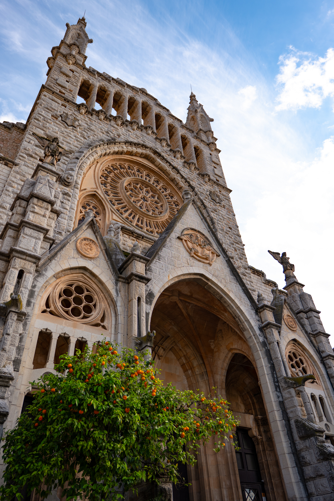The stunning façade of Sant Bartomeu Church in Soller, Mallorca