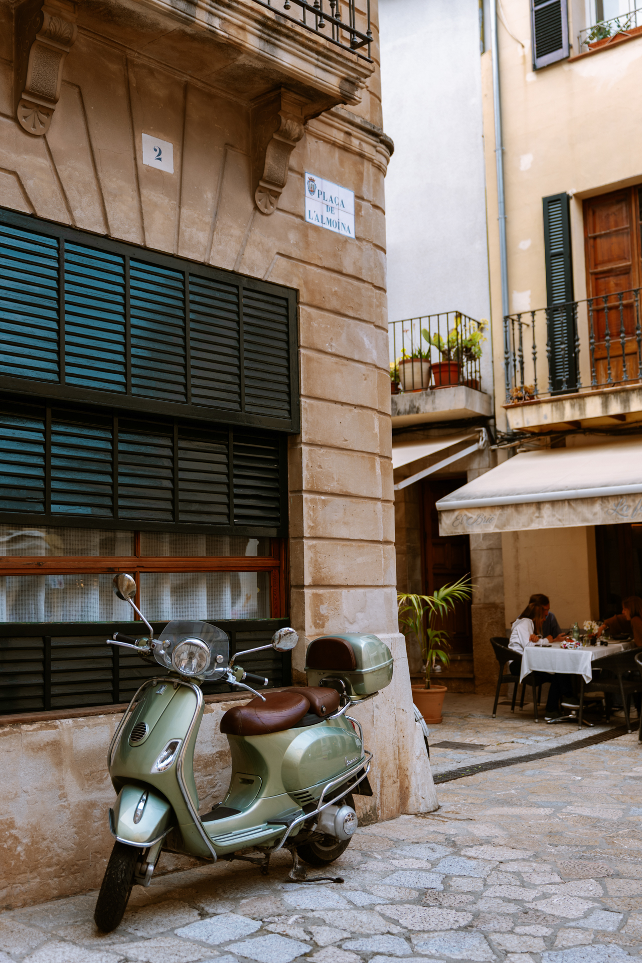Vintage Vespa in Plaça de l'Almoina, Pollença Old Town