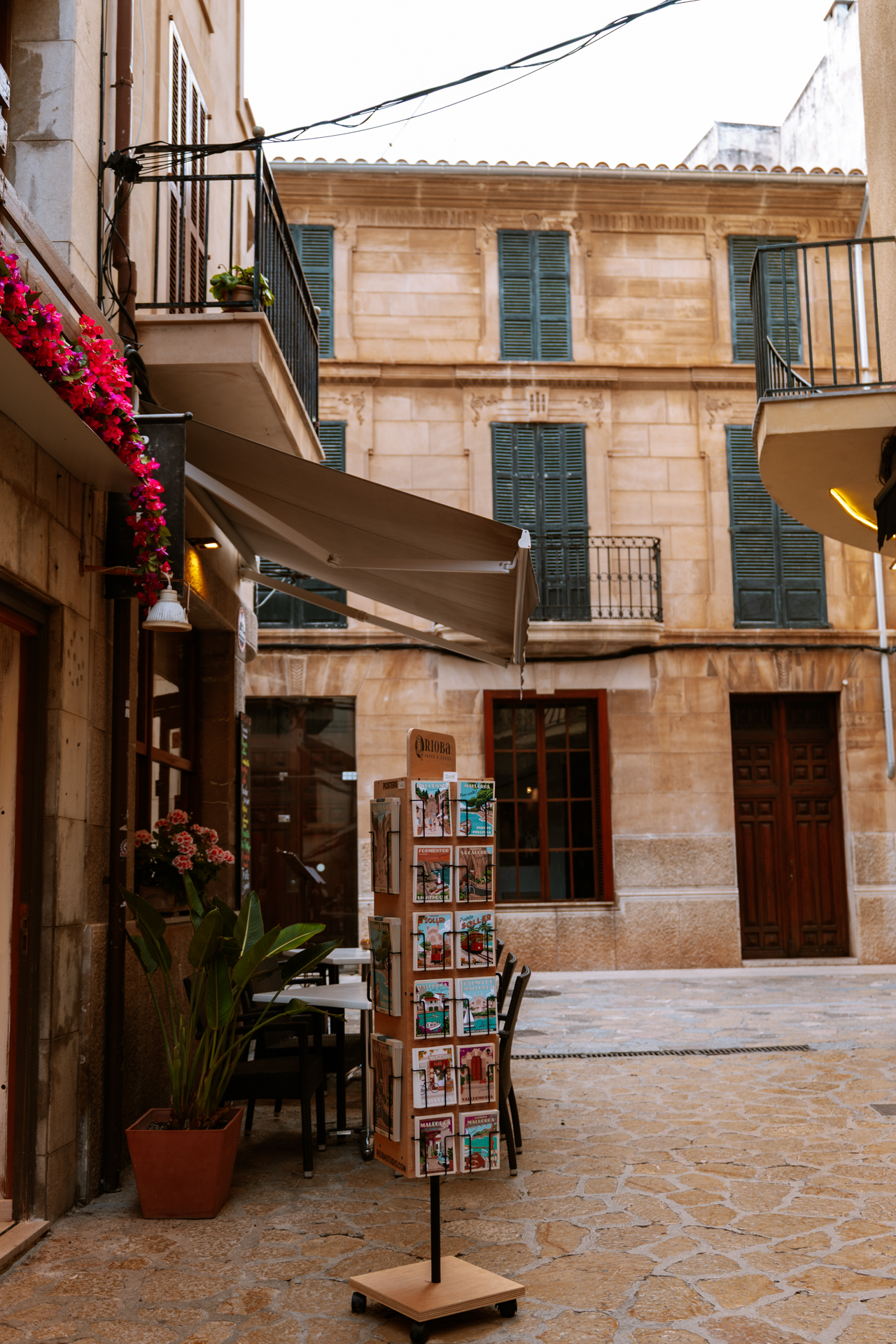 Charming side street with postcard shop in Pollença