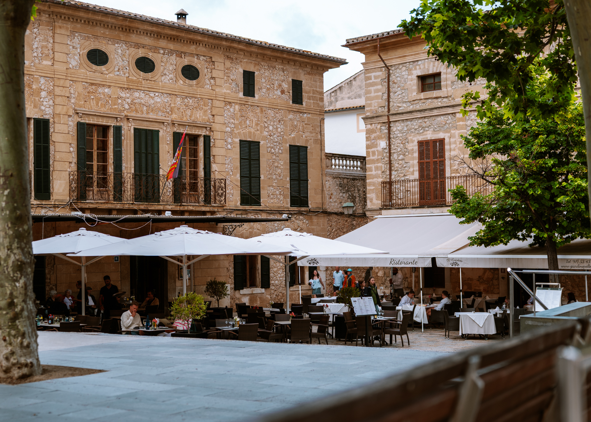 Outdoor dining at Plaça Major in Pollença Old Town, Mallorca
