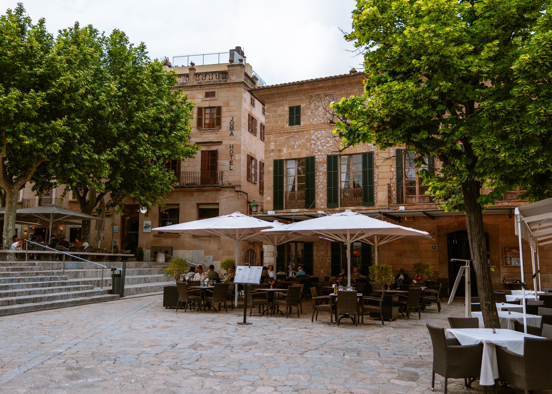 Outdoor cafés in Plaça Major, Pollença Old Town
