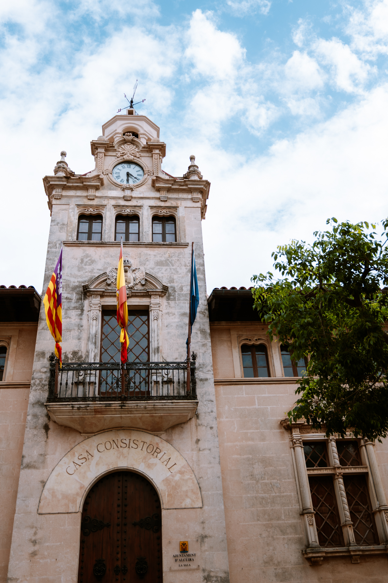 Alcúdia Town Hall clock tower in Plaça de la Constitució, Mallorca.