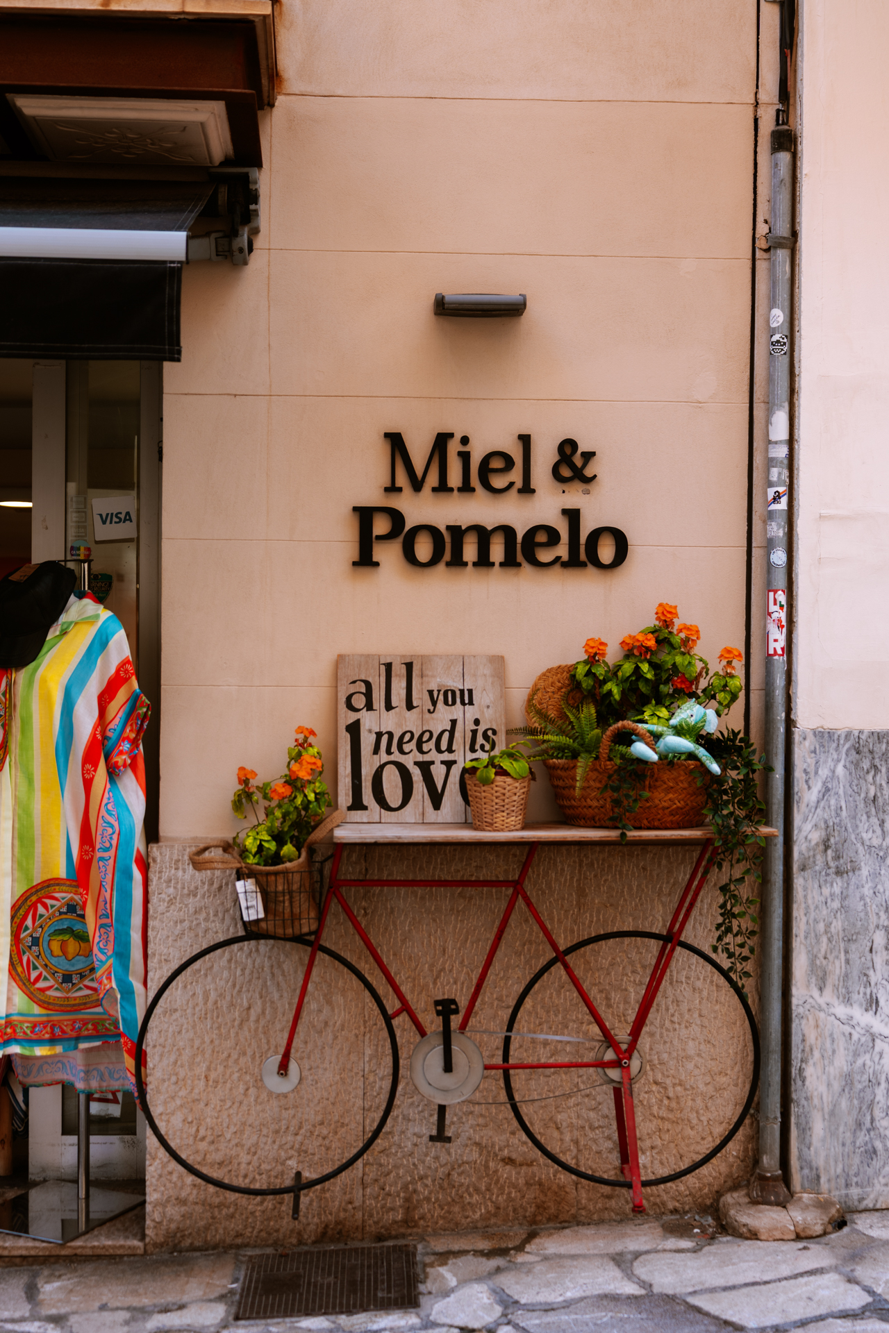 Charming storefront outside Miel & Pomelo in Palma de Mallorca, Spain.