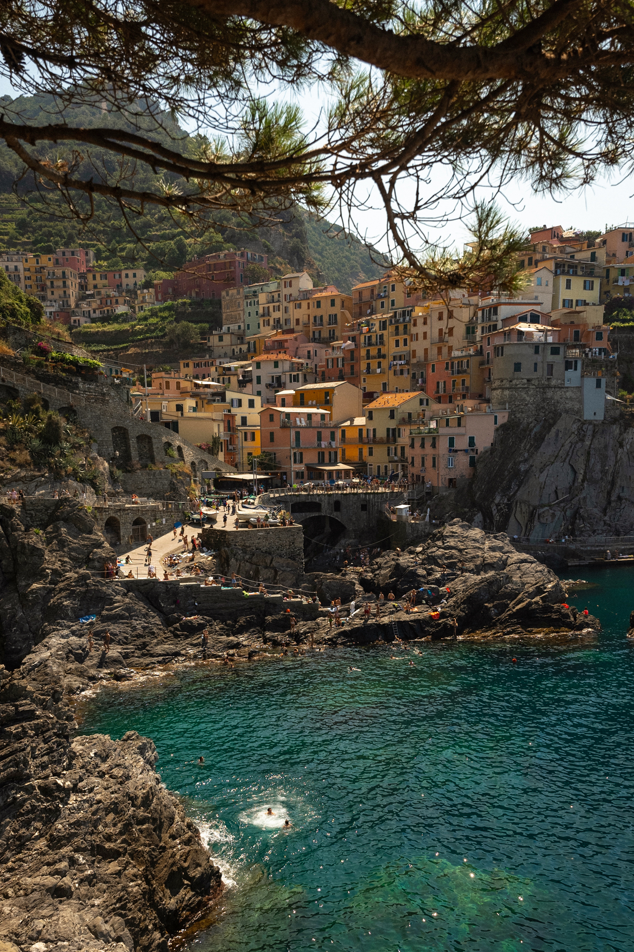 Manarola village and swimming cove in Cinque Terre, Italy