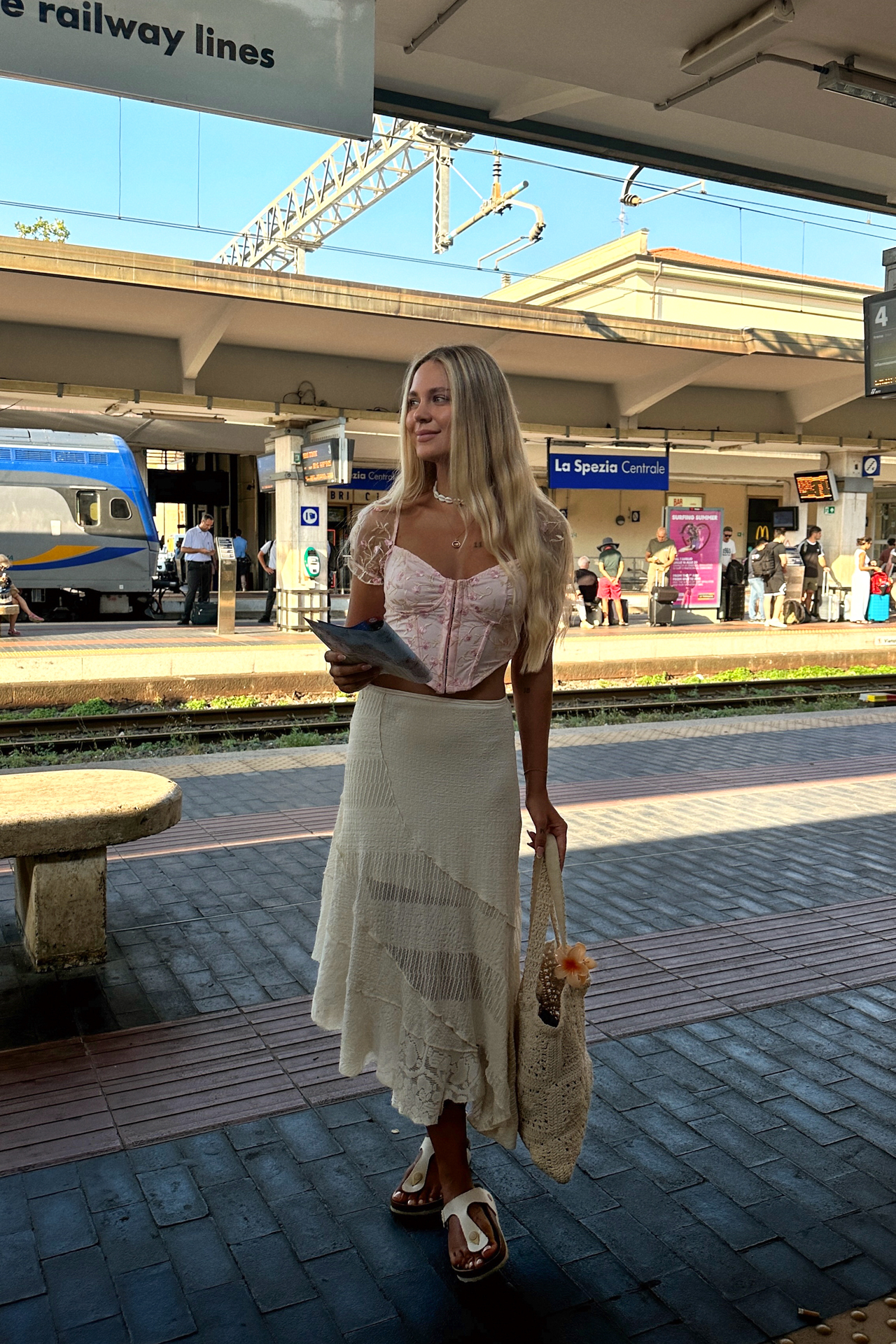 Woman at La Spezia Centrale train station in Italy