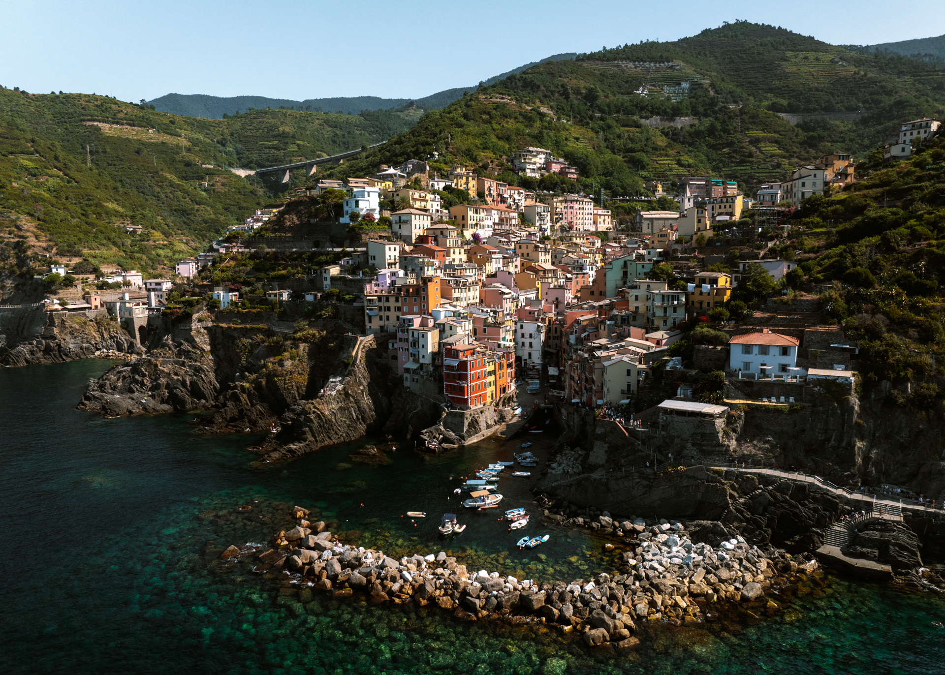 Riomaggiore village and coastline in Cinque Terre, Italy