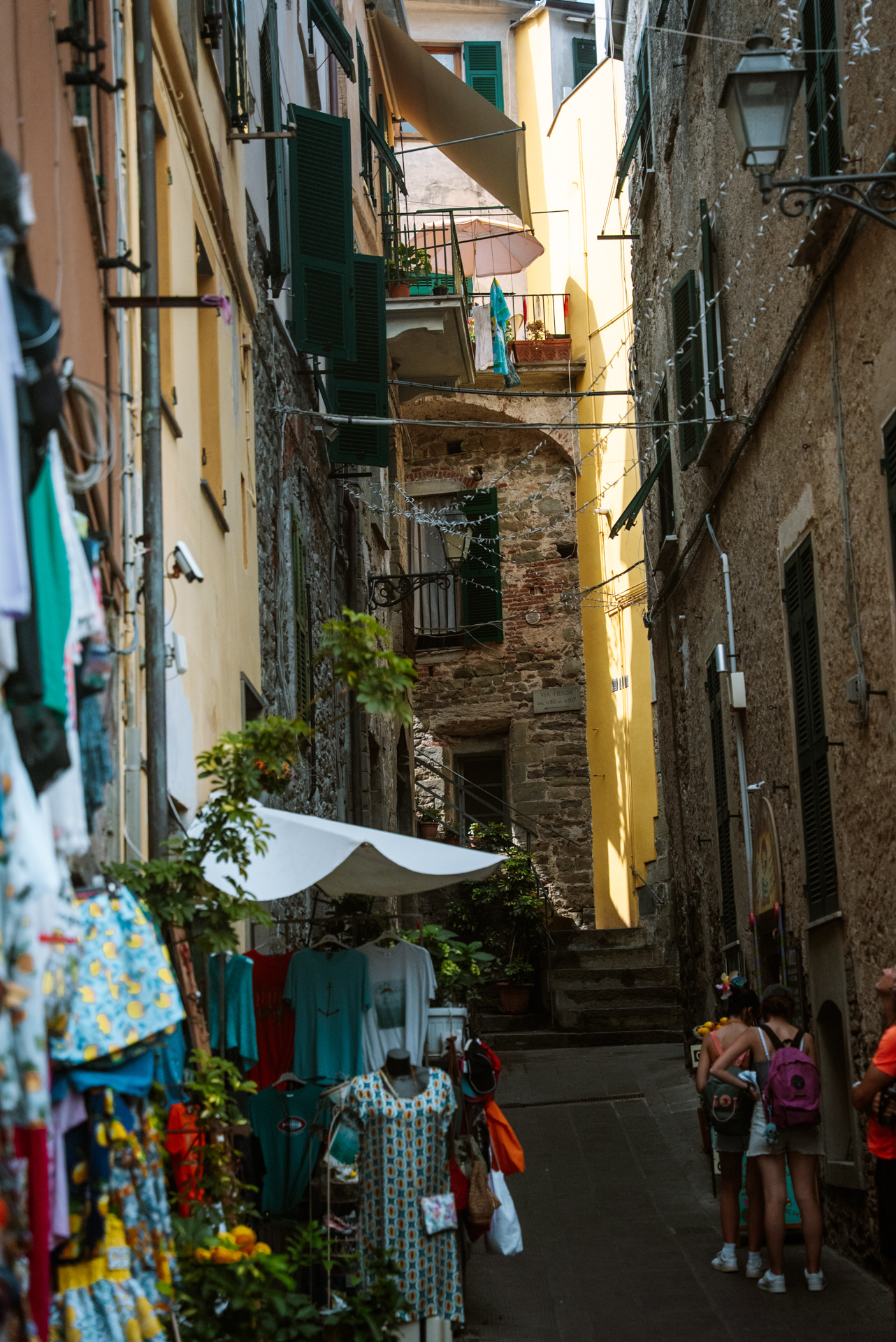 Narrow shopping street in Corniglia, Cinque Terre, Italy