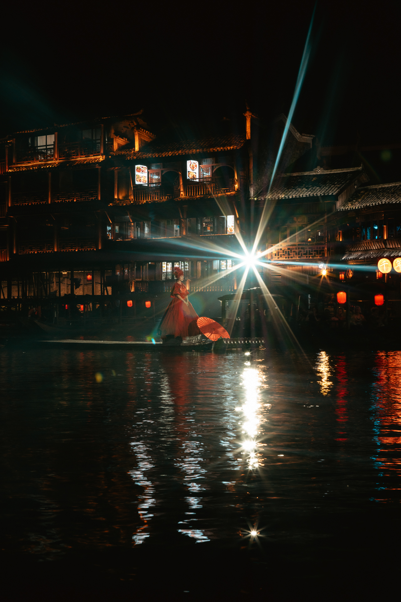 Night performance on the Tuojiang River in Fenghuang Ancient Town, China