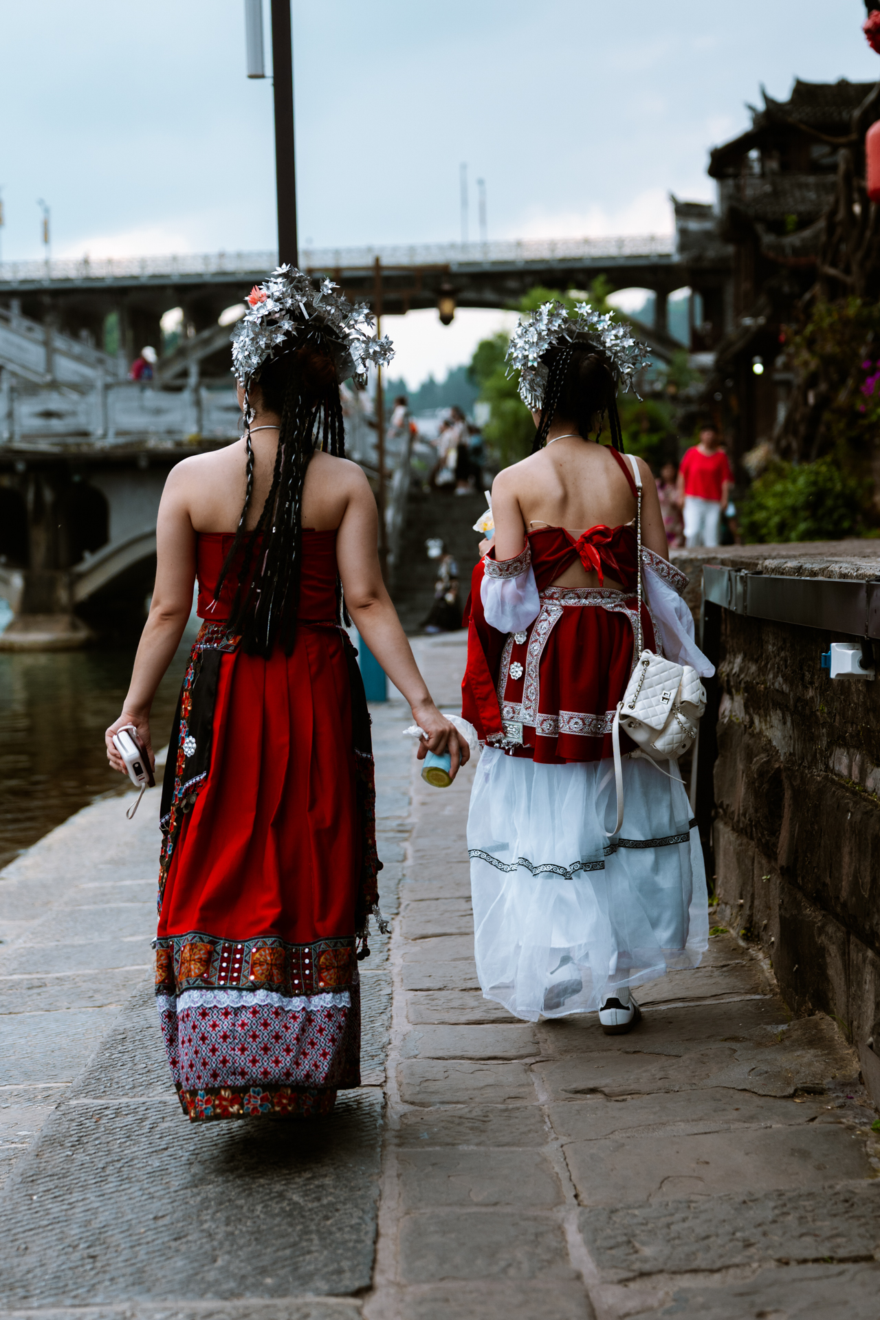Traditional clothing and silver headdresses in Fenghuang Ancient Town, China