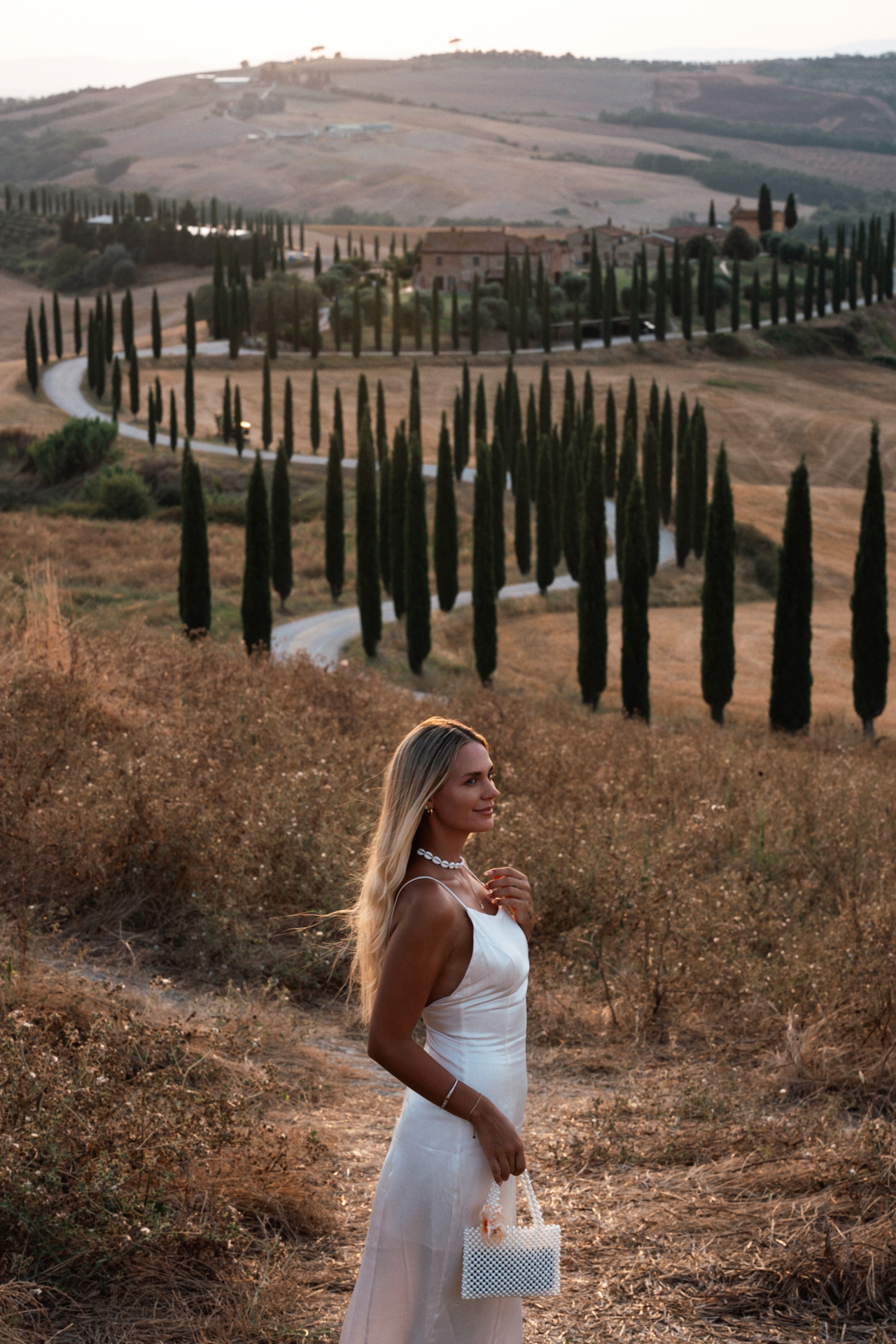 Scenic Val d’Orcia countryside with winding cypress road